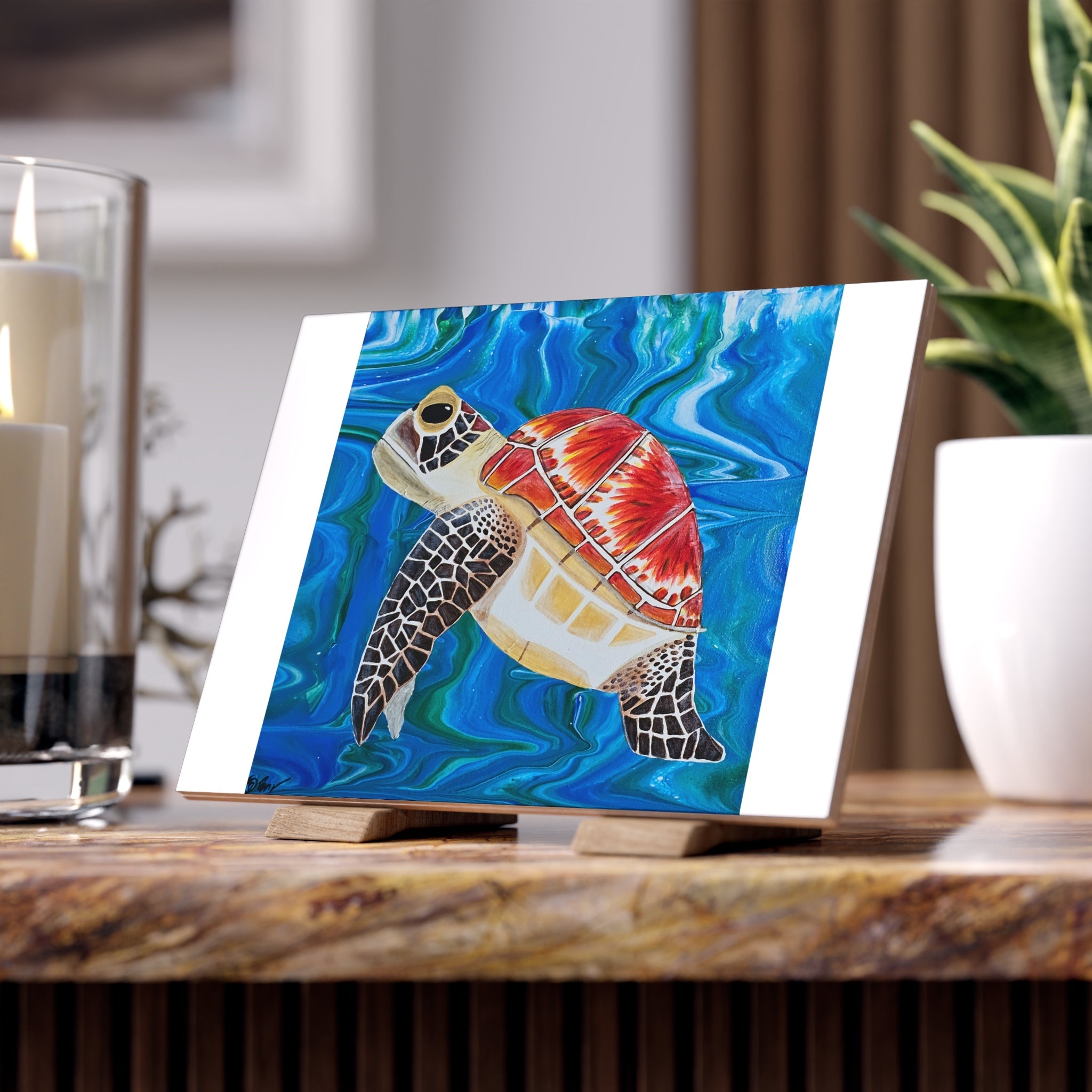 White tile with image of sea turtle swimming in blue sea