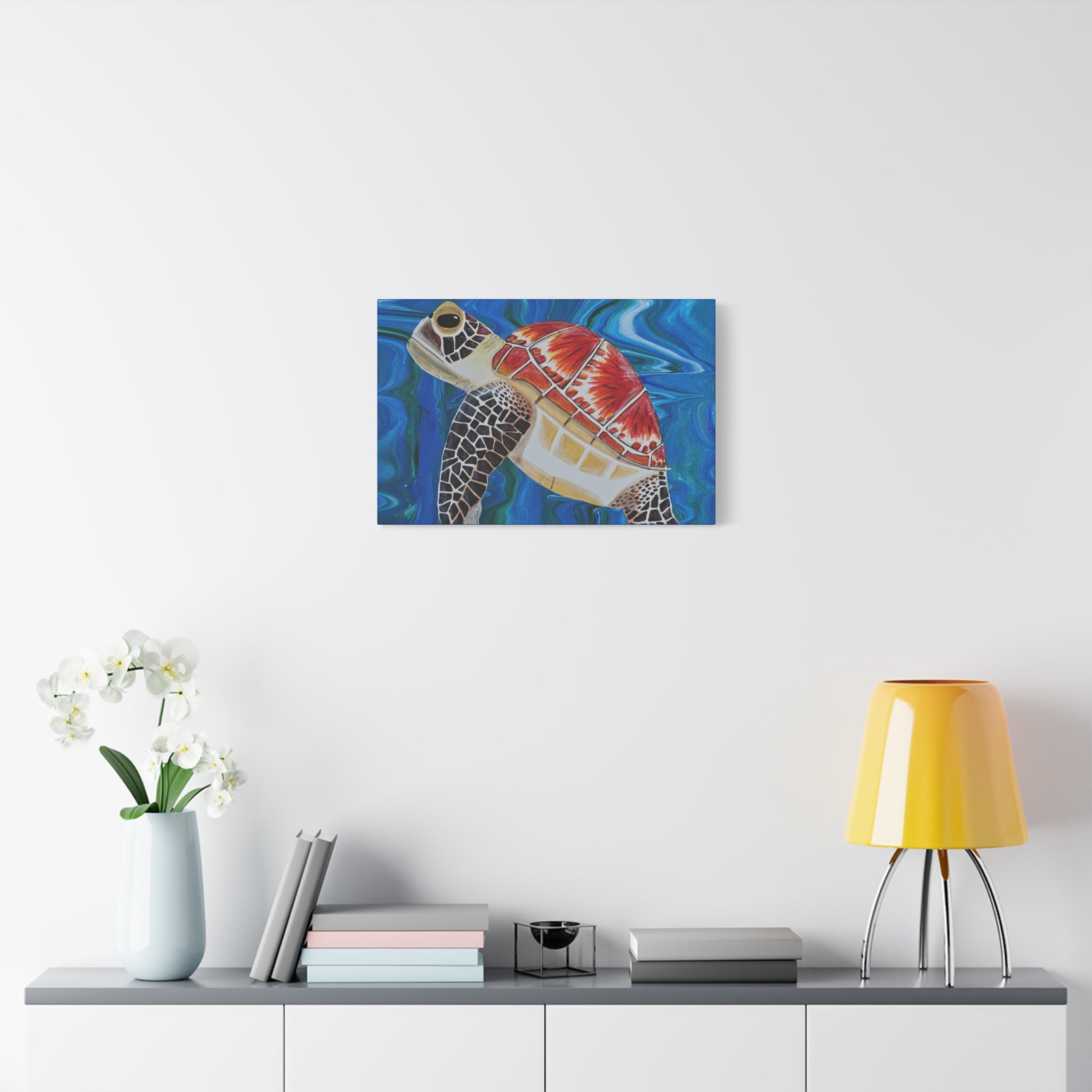 Colorful turtle painting on a wall above a shelf with decor items.