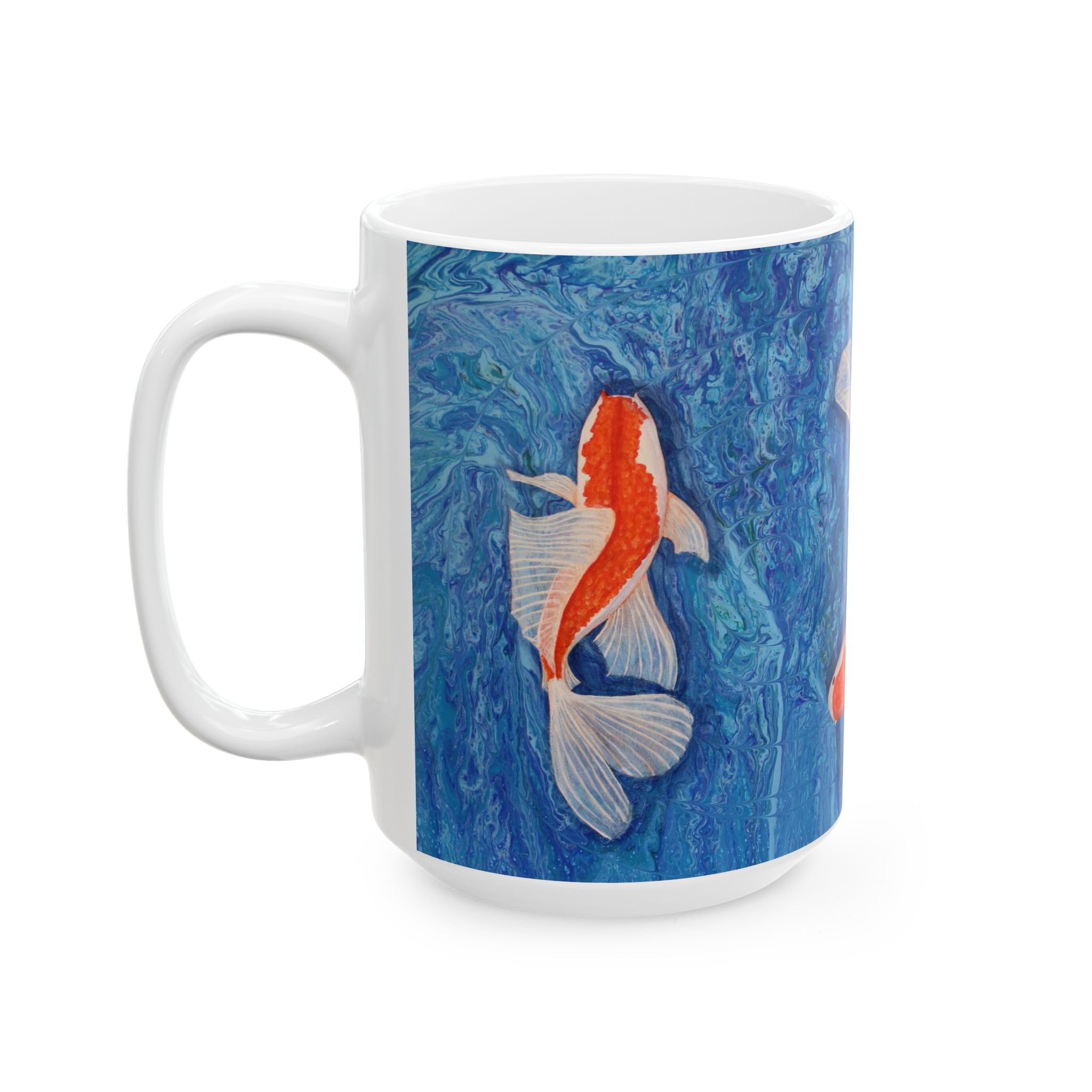 Mug with a koi fish design on a blue marbled background