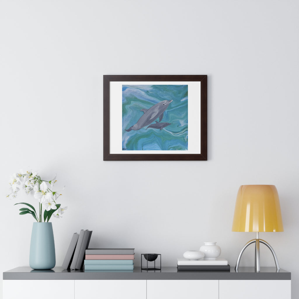 Framed artwork of dolphins on a wall above a shelf with decor items.