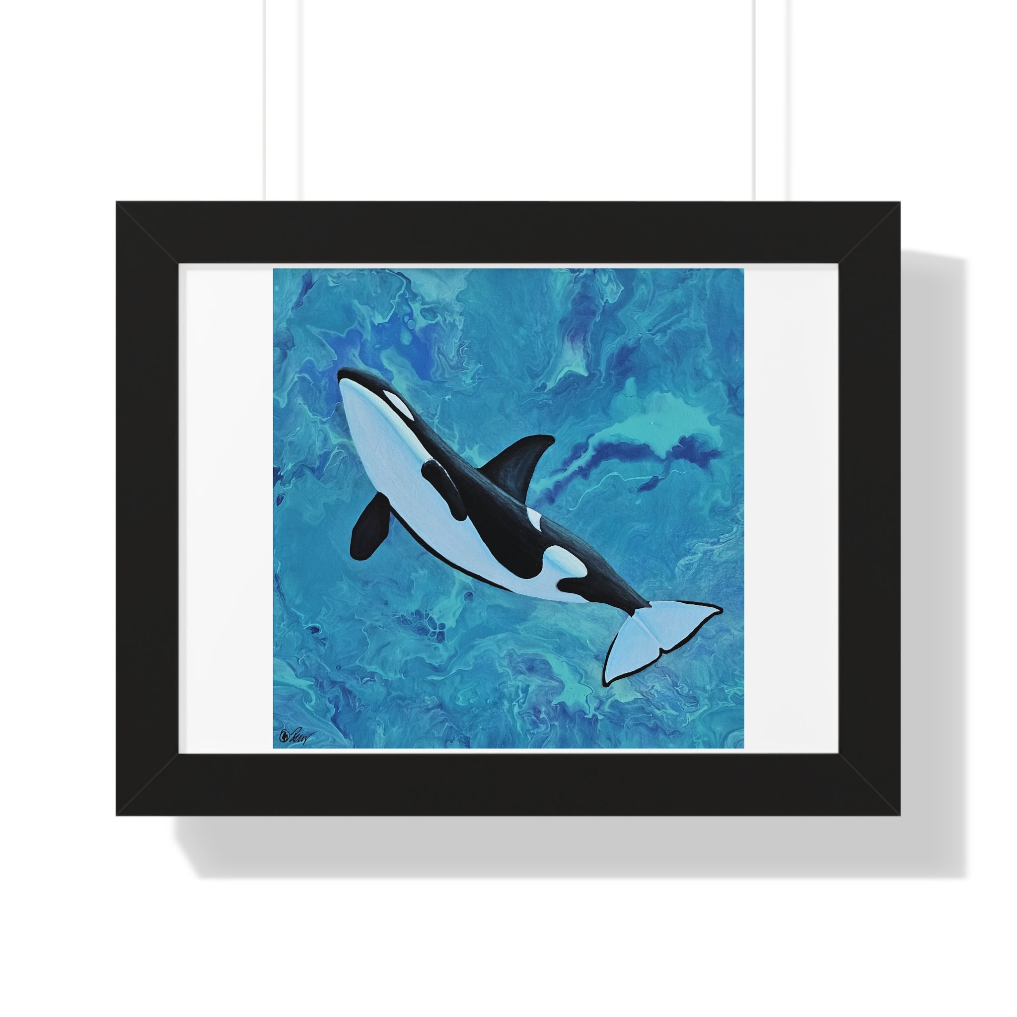 Framed artwork of an orca whale on a blue abstract background