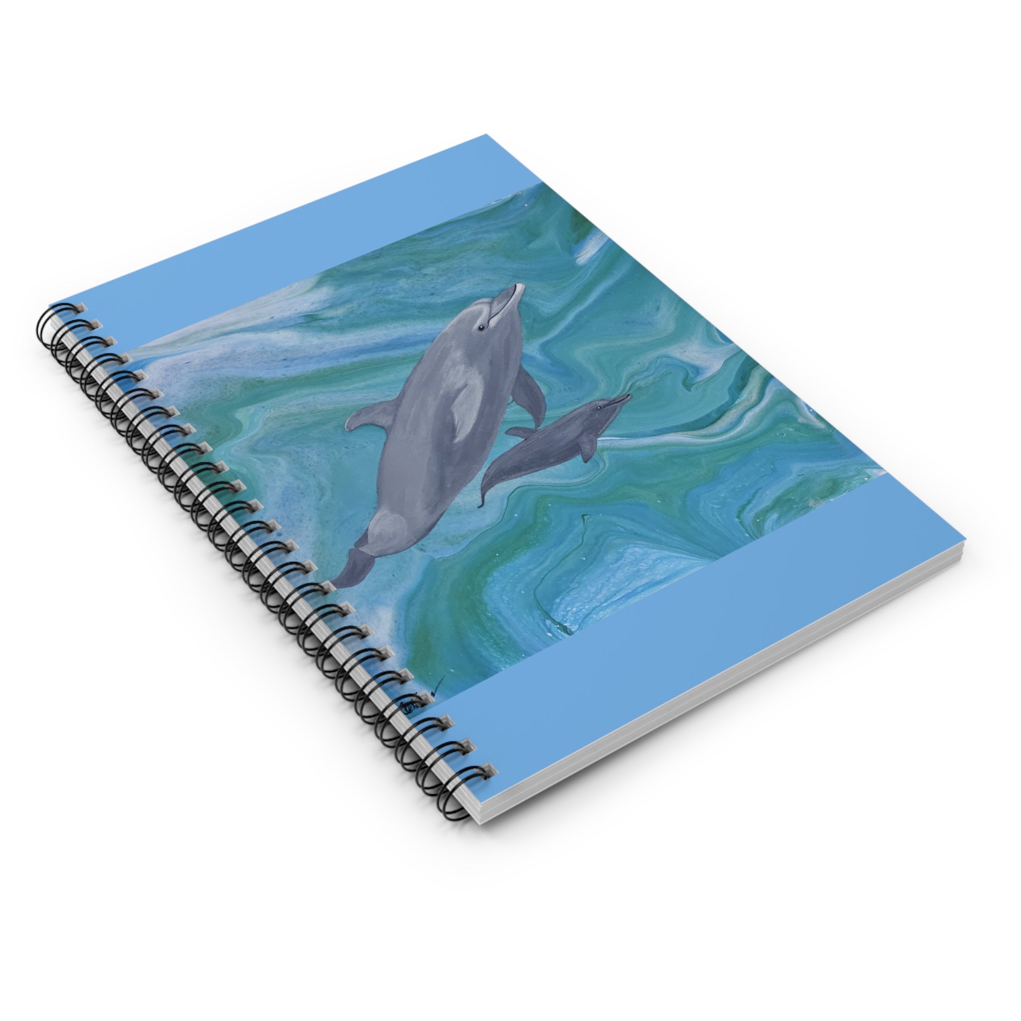 Notebook with dolphins on a blue and green wave design