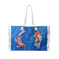 Tote bag with koi fish design on a blue background
