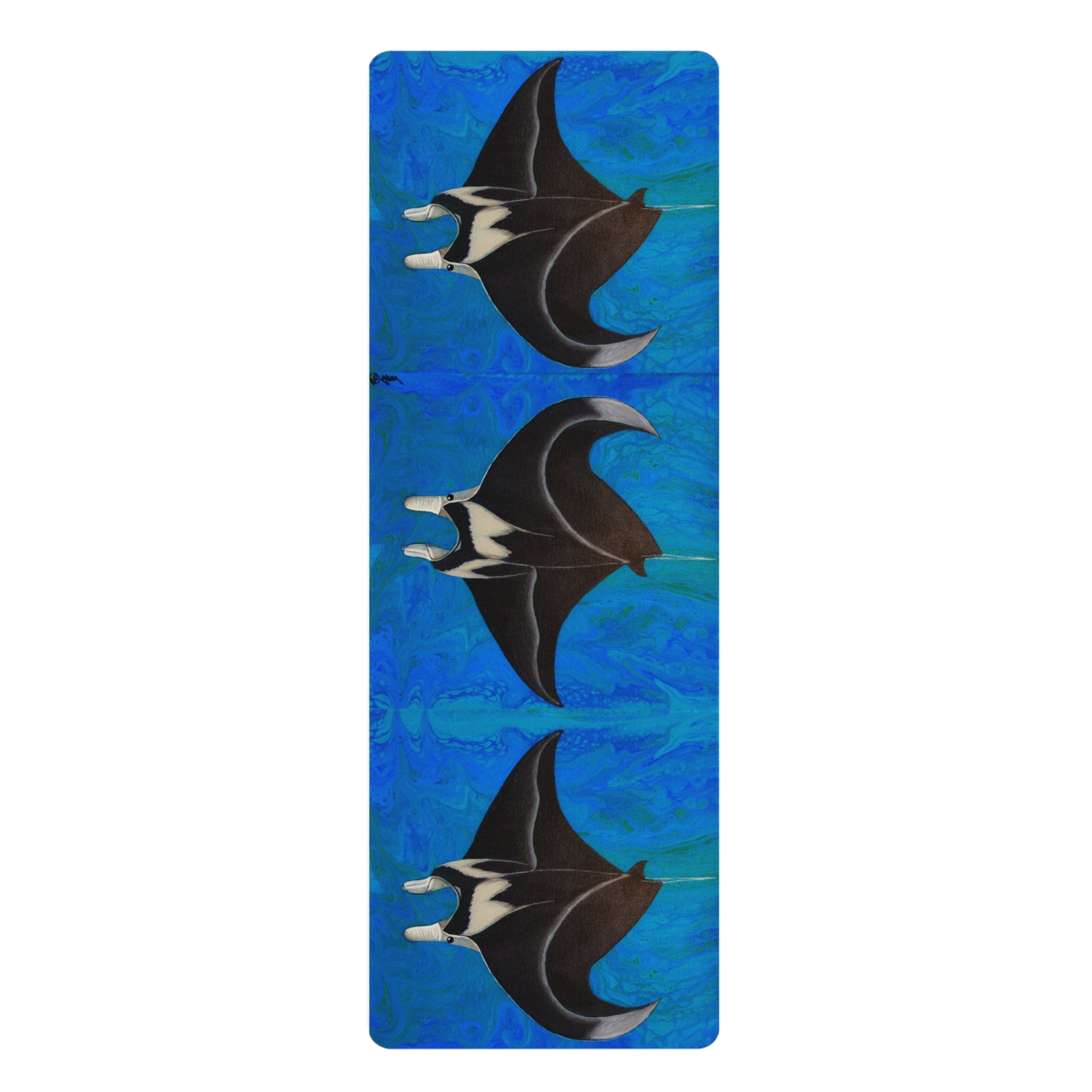 Yoga mat with manta ray design on a blue background