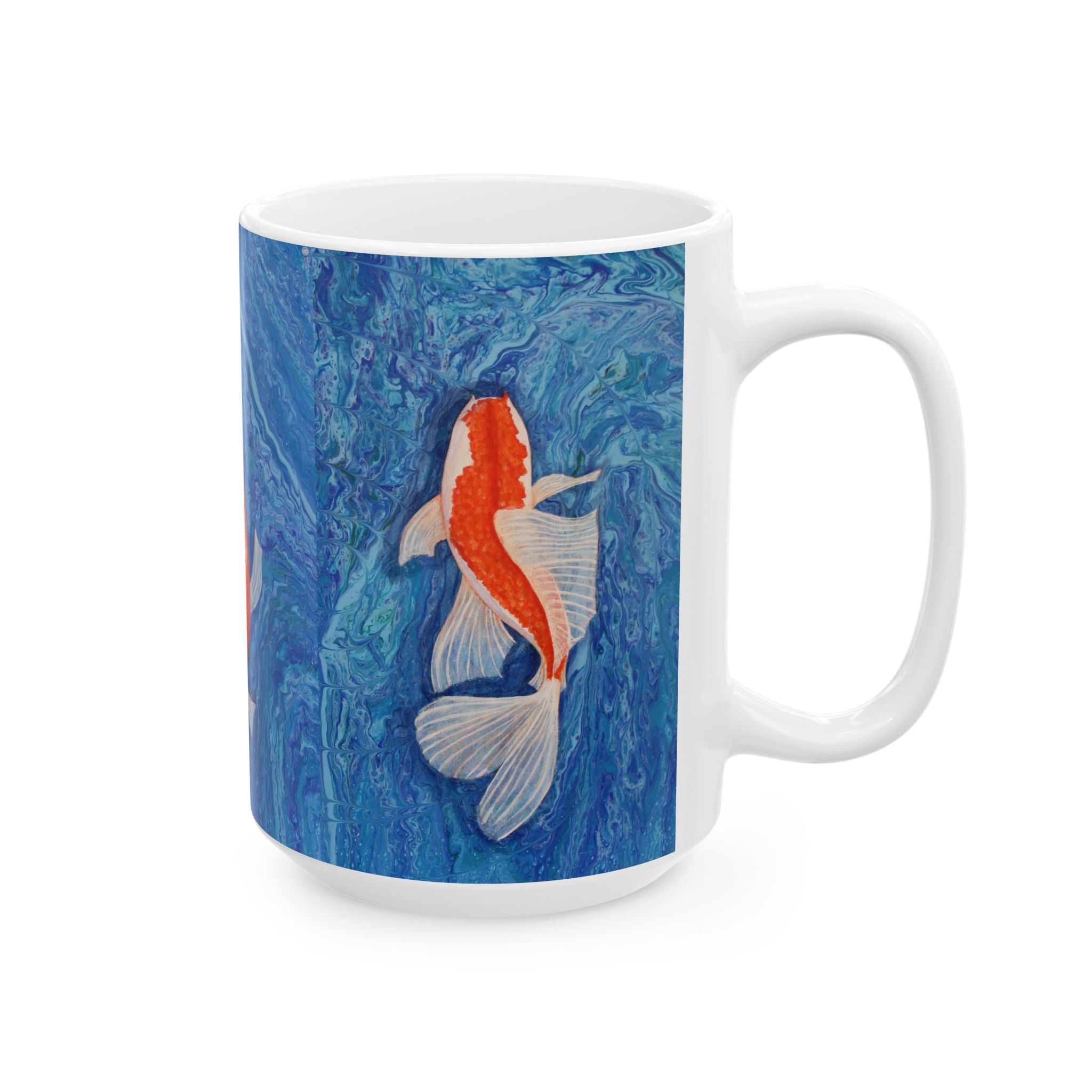 Mug with a koi fish design on a blue watercolor background