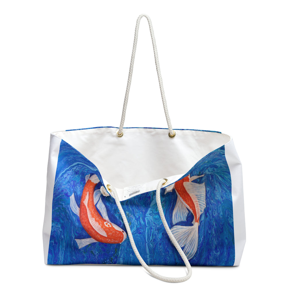 Tote bag with koi fish design on a blue and white background