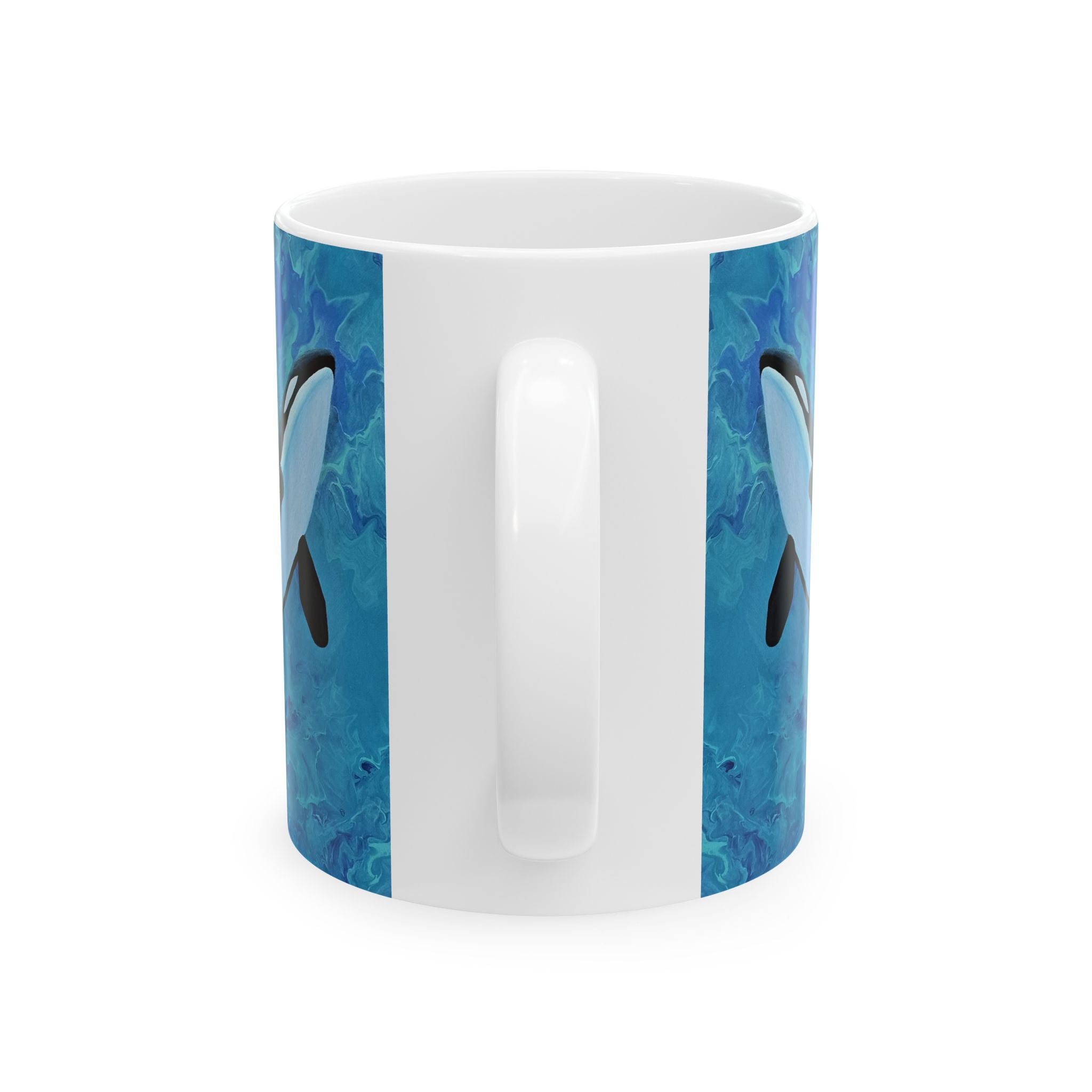 White mug with blue dolphin design on a white background
