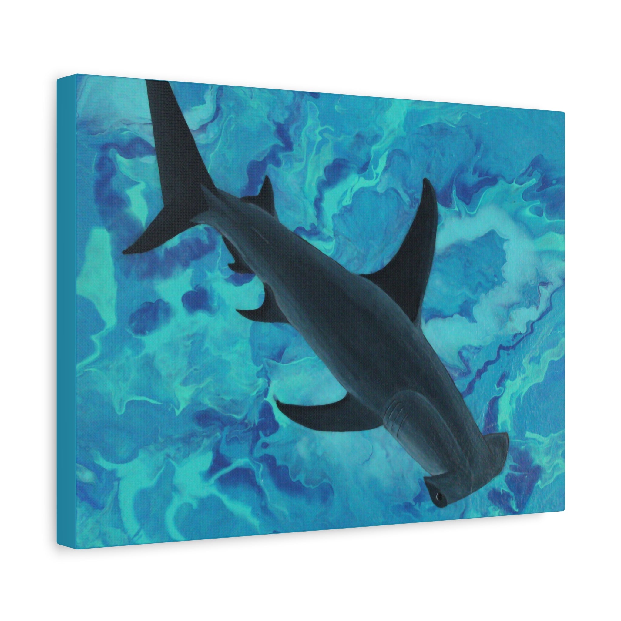 Canvas print of a shark swimming against a blue abstract background