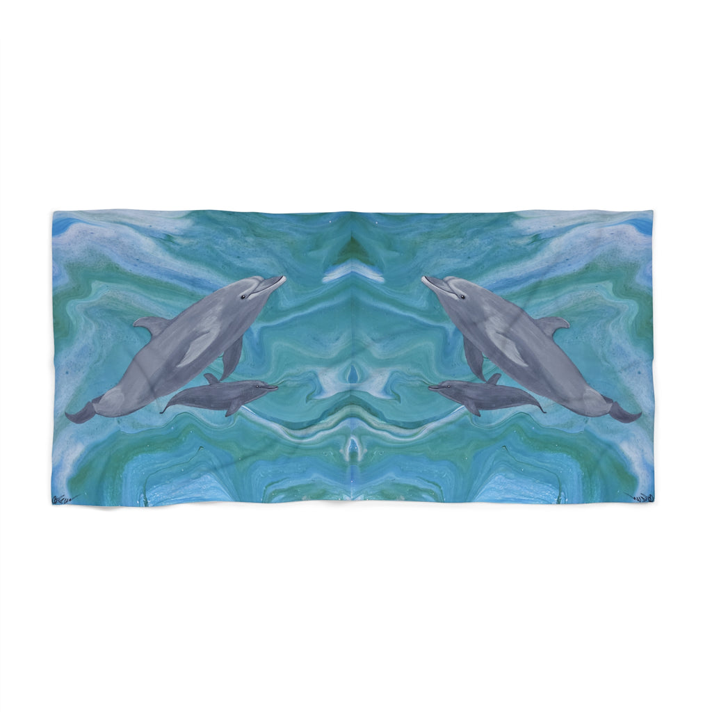 Towel/blanket with dolphins design on a blue and green abstract background