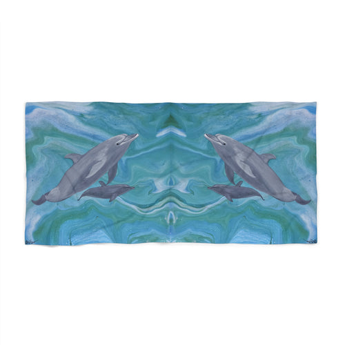 Towel/blanket with dolphins design on a blue and green abstract background
