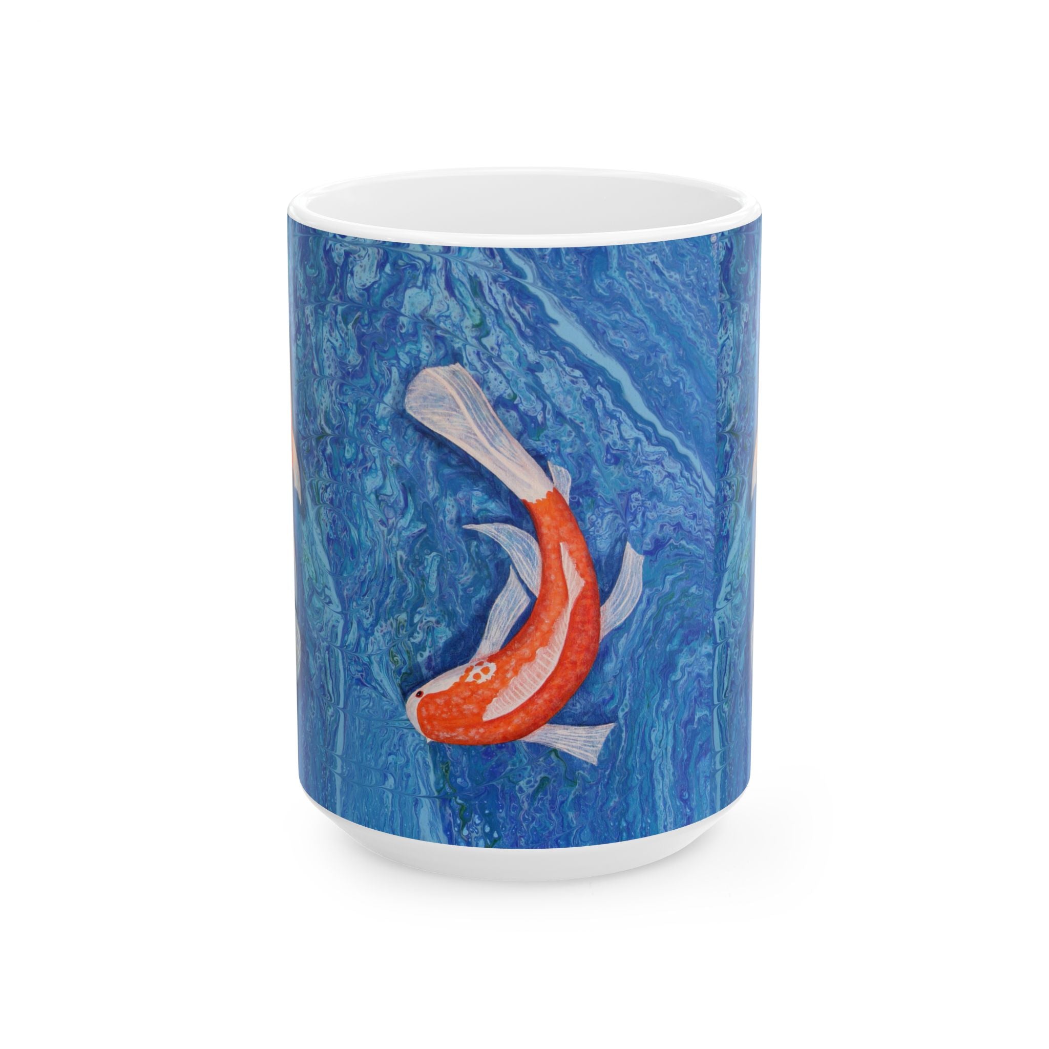 Mug with a design of two fish on a blue marble background