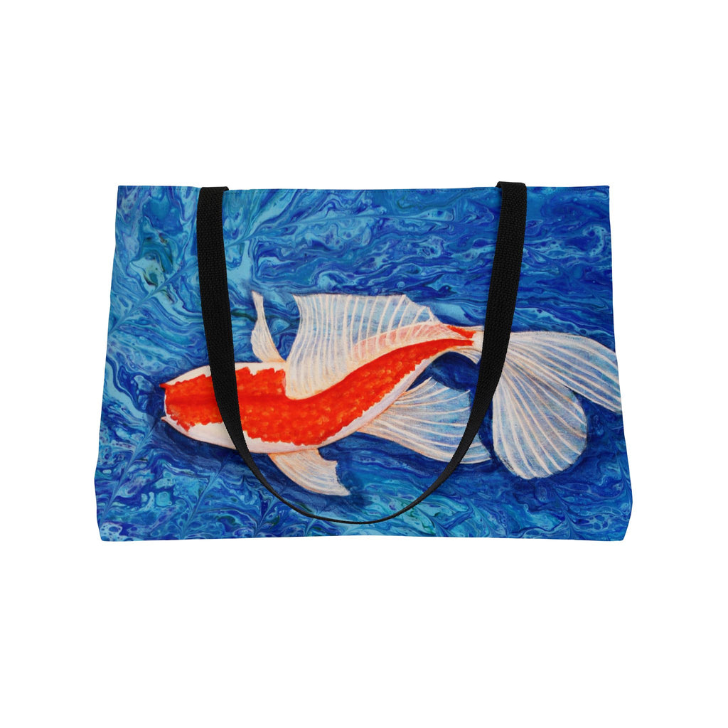Tote bag with a goldfish design on a blue water background
