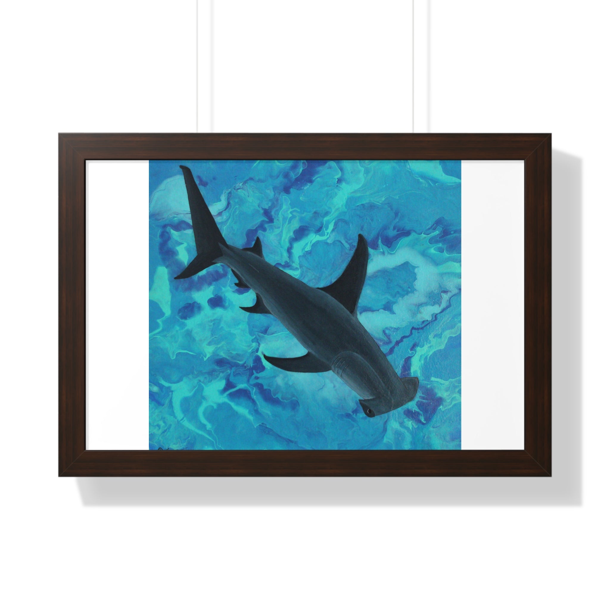 Framed artwork of a shark swimming underwater with a blue and green pattern.