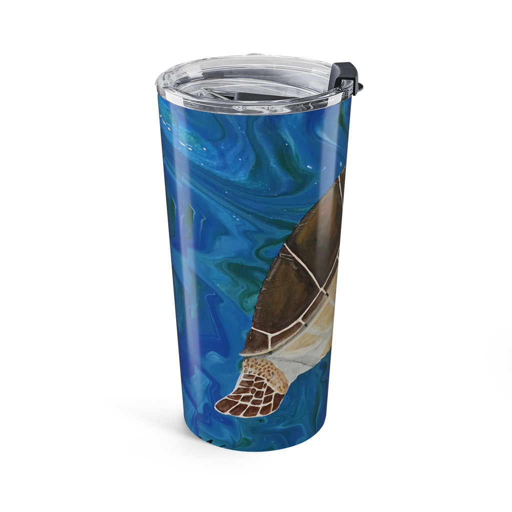 Tumbler with turtle design on a blue background