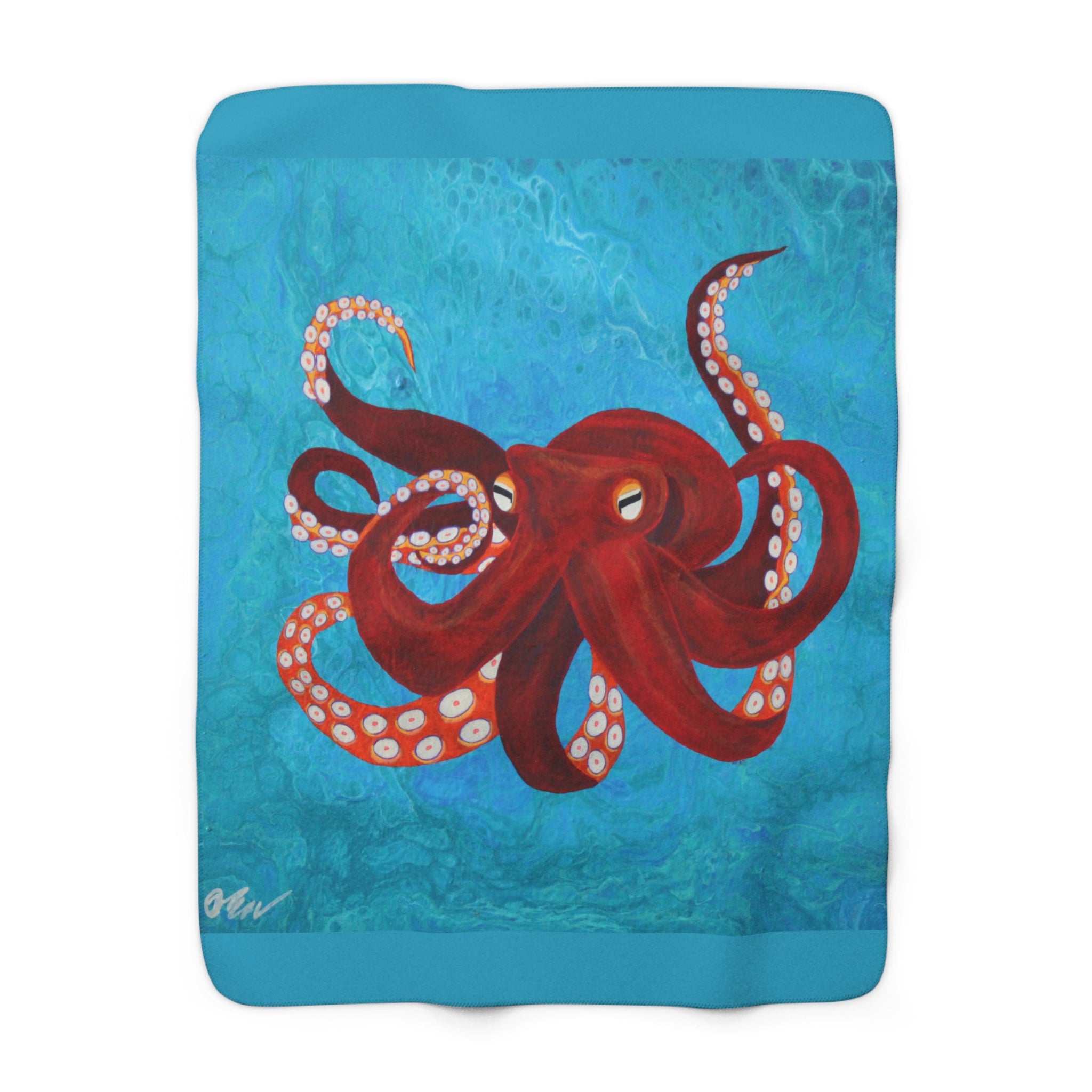 Blanket with a red octopus design on a blue background