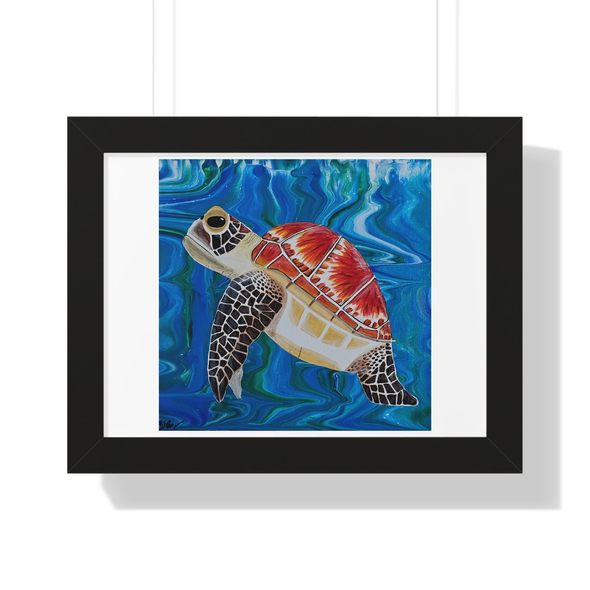 Framed artwork of a turtle with a colorful shell on a blue wave background