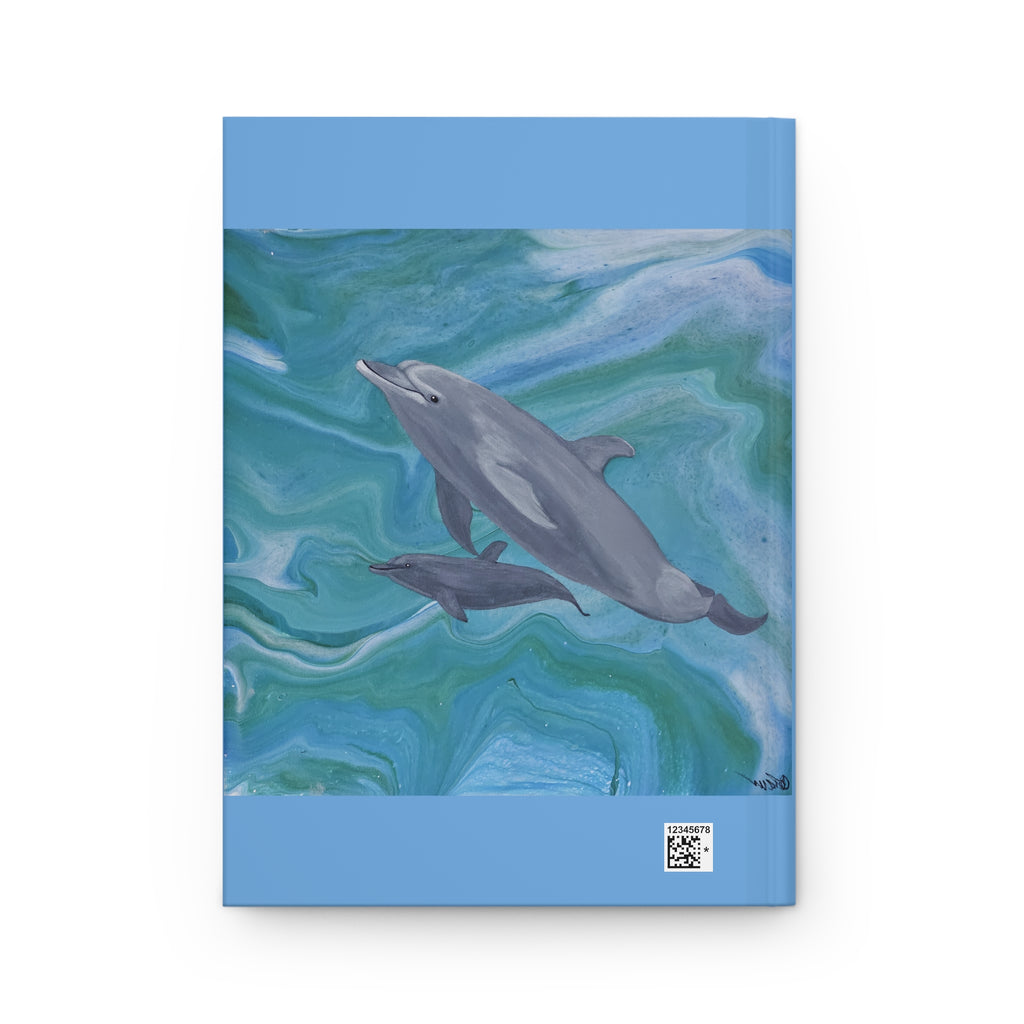 Notebook with a dolphin illustration on a blue and green abstract background