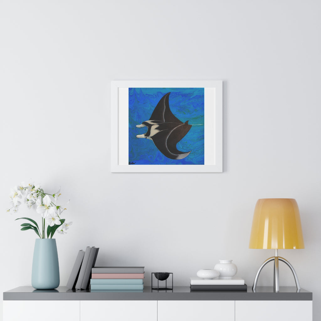 Framed artwork of a manta ray on a wall above a shelf with decor items.