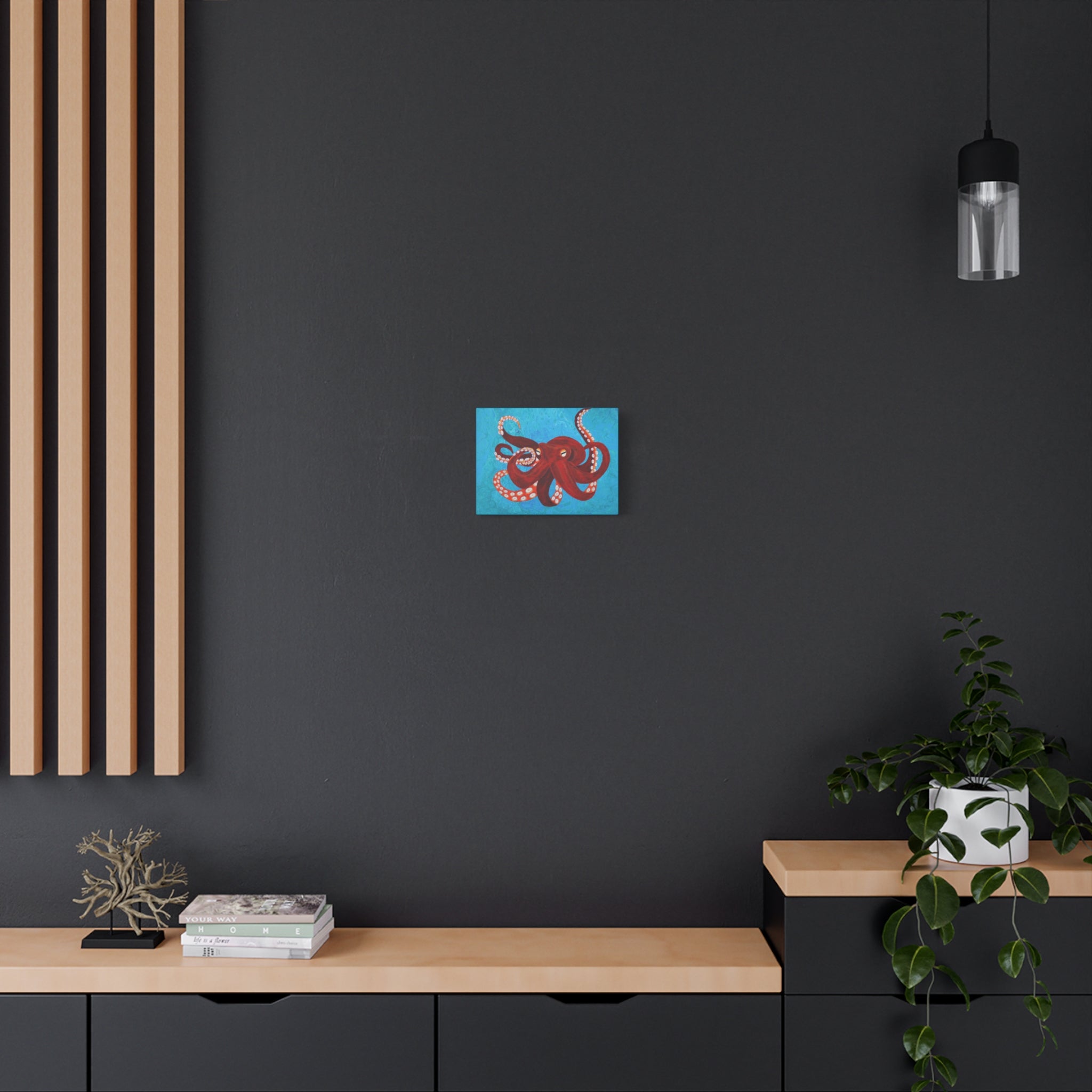 Modern interior with a dark wall, wooden shelf, and decorative items.