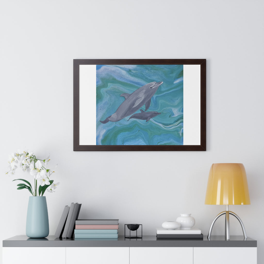 Framed artwork of dolphins on a wall above a shelf with decor items.
