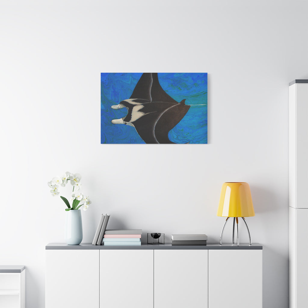 Abstract painting of a manta ray on a white wall above a shelf with decor items.