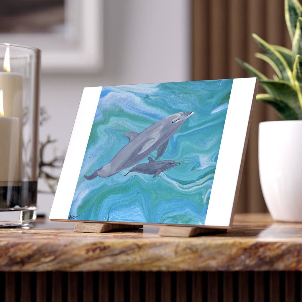 Art print of dolphins on a stand with a blurred background tile