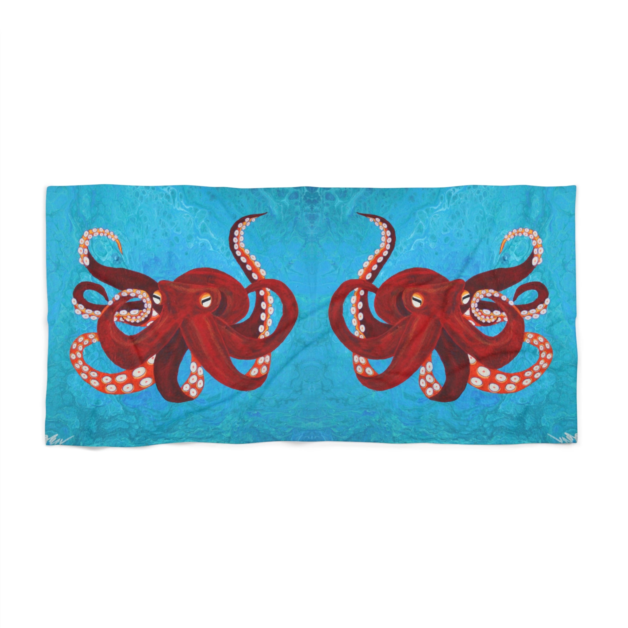 Towel/blanket with red octopus design on a blue background