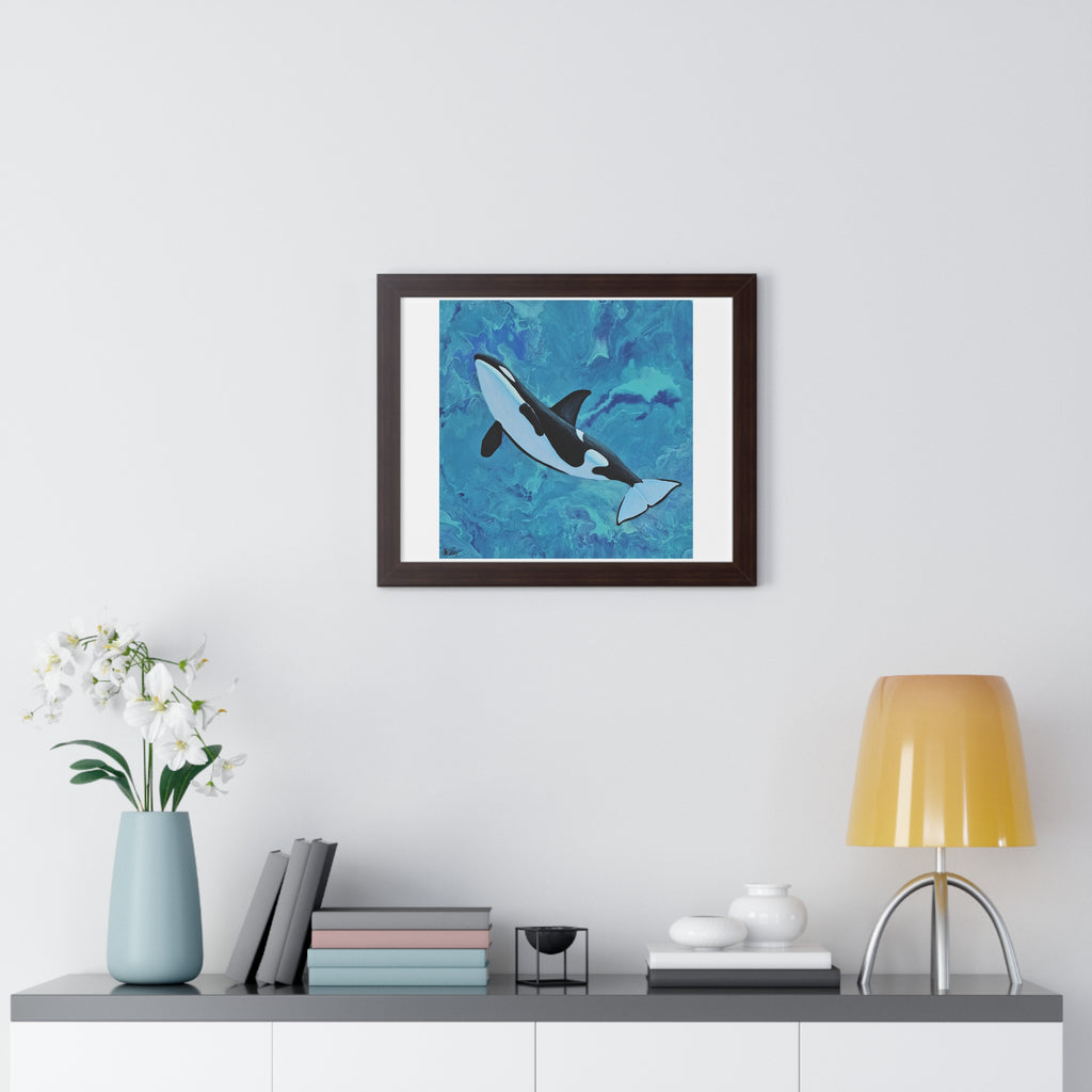 Framed artwork of a whale on a wall above a shelf with decor items.