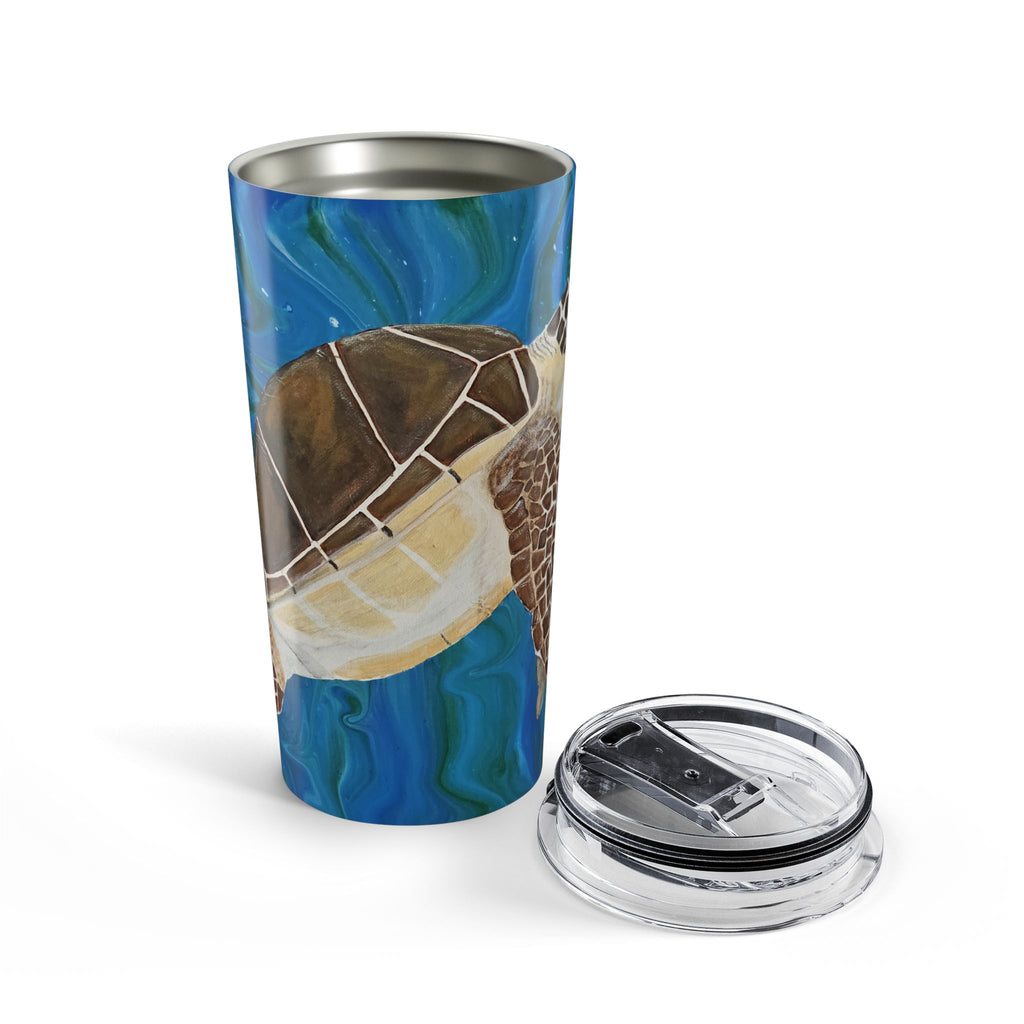 Tumbler with a turtle design on a blue background