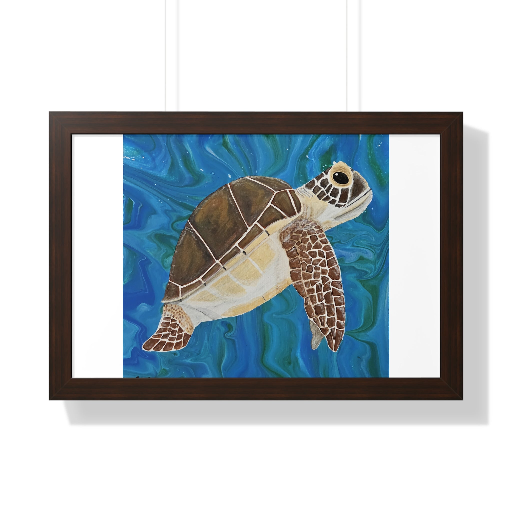 Framed artwork of a turtle swimming underwater with a blue and green background.