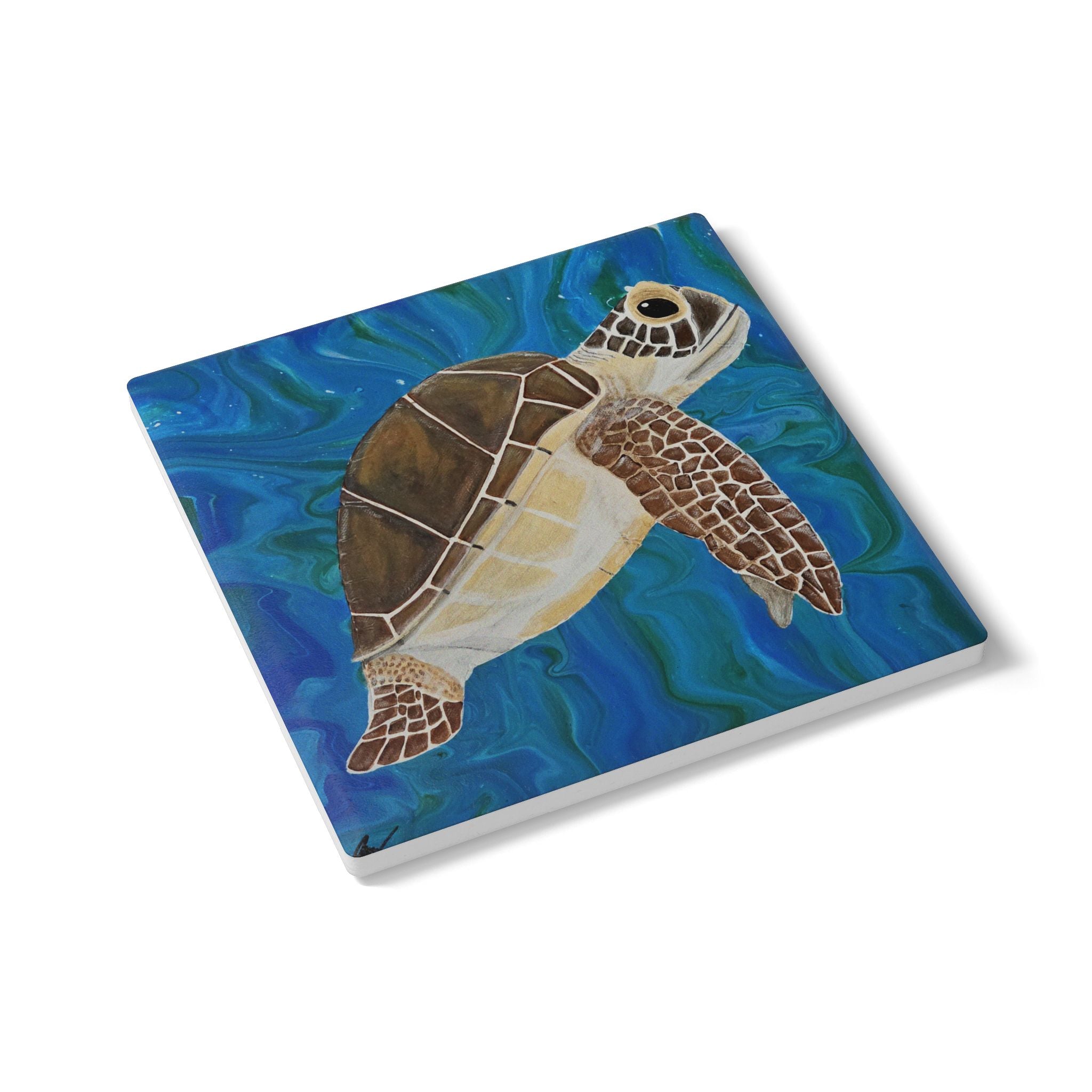 Coaster with a painted turtle design on a blue underwater background