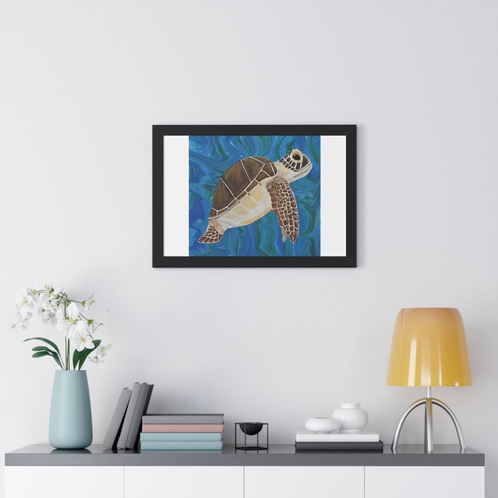 Framed artwork of a turtle on a wall above a shelf with decor items.