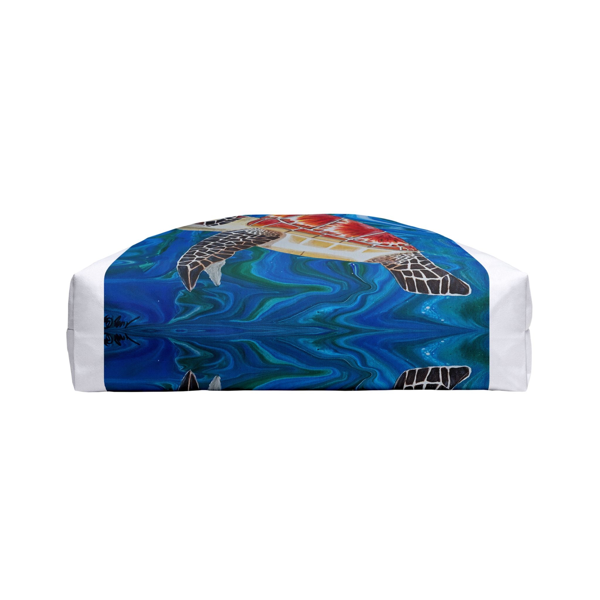 Rectangular bottom of bag with turtle design on a blue and green abstract pattern