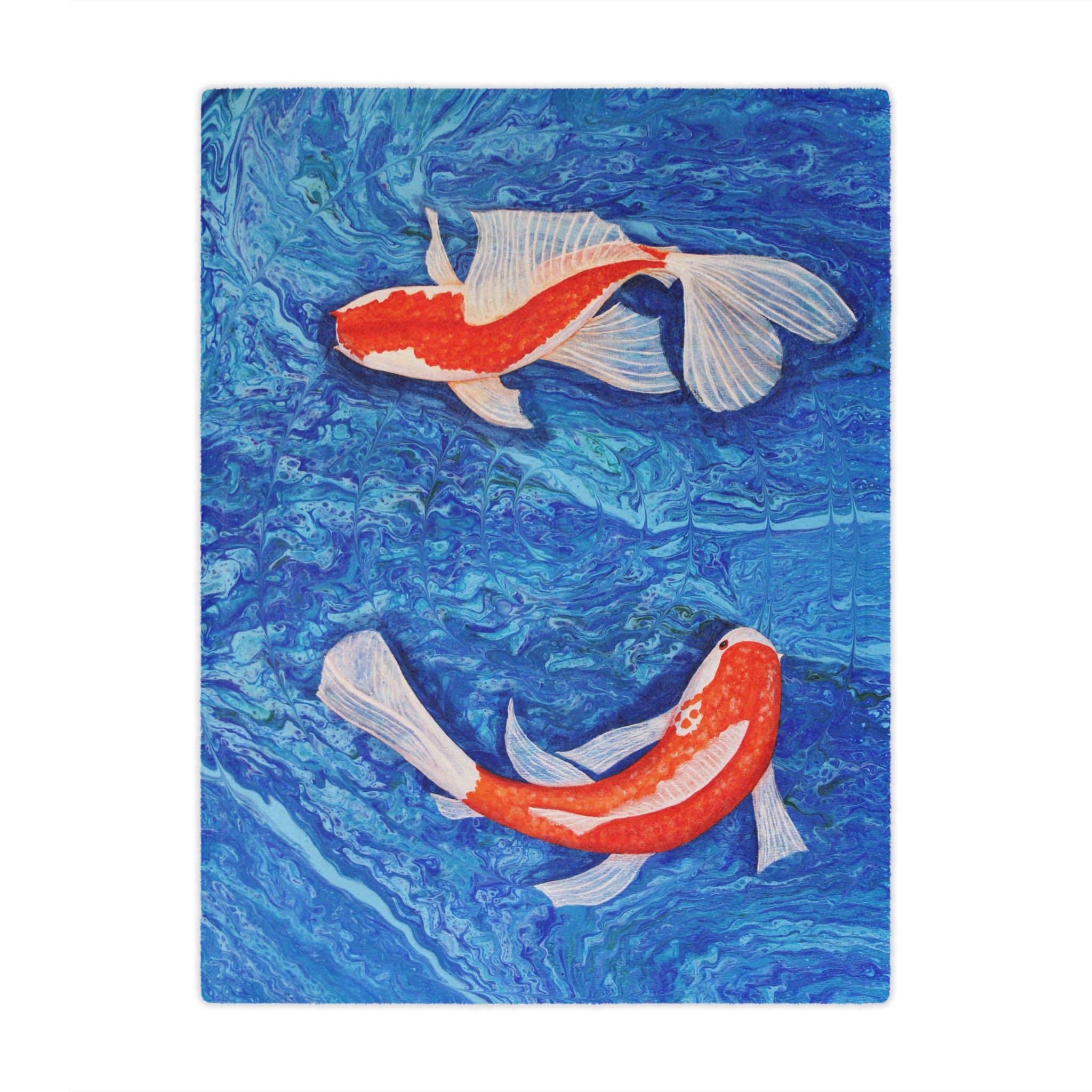 Two koi fish swimming in blue water on a blanket