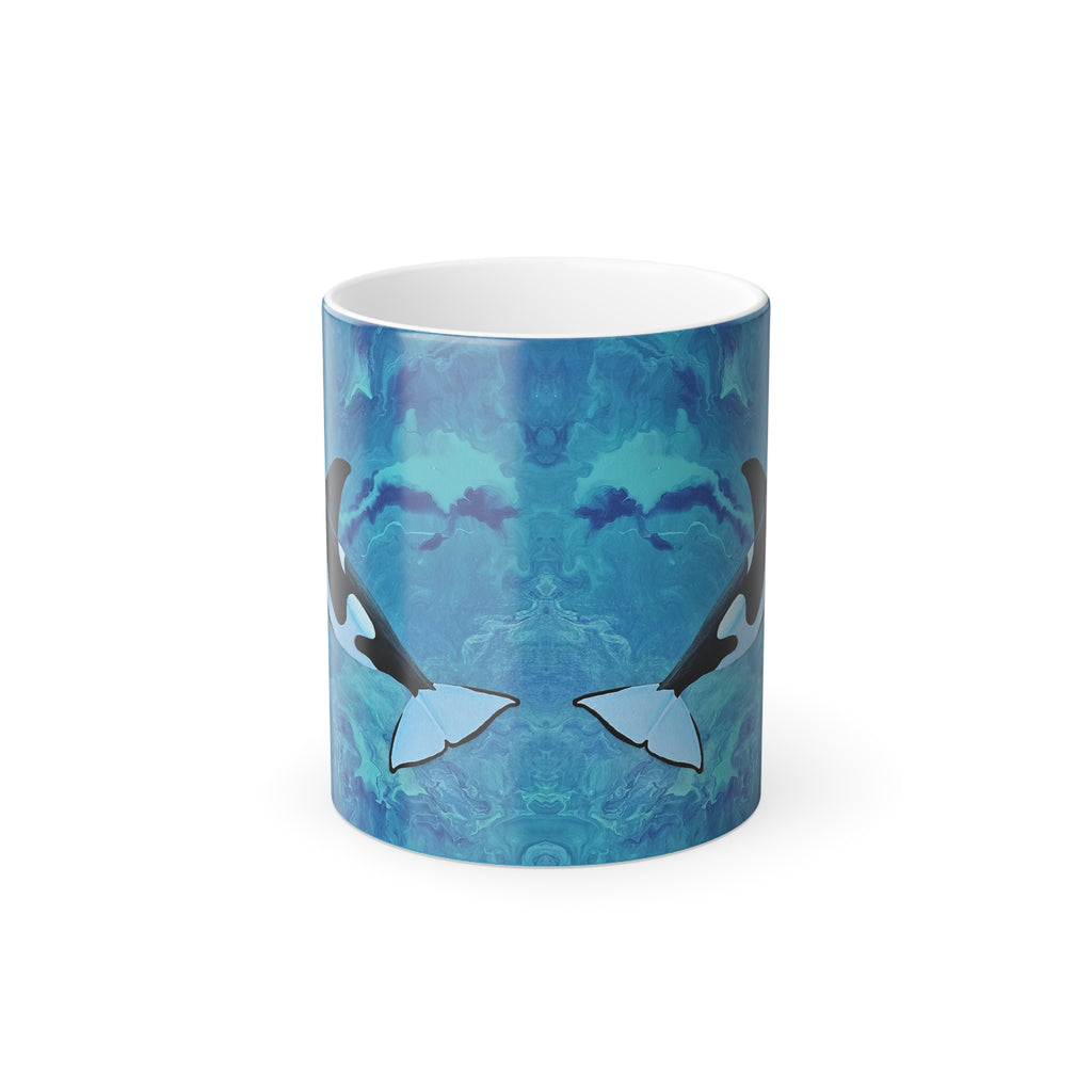 Mug with whale design on a blue and white background