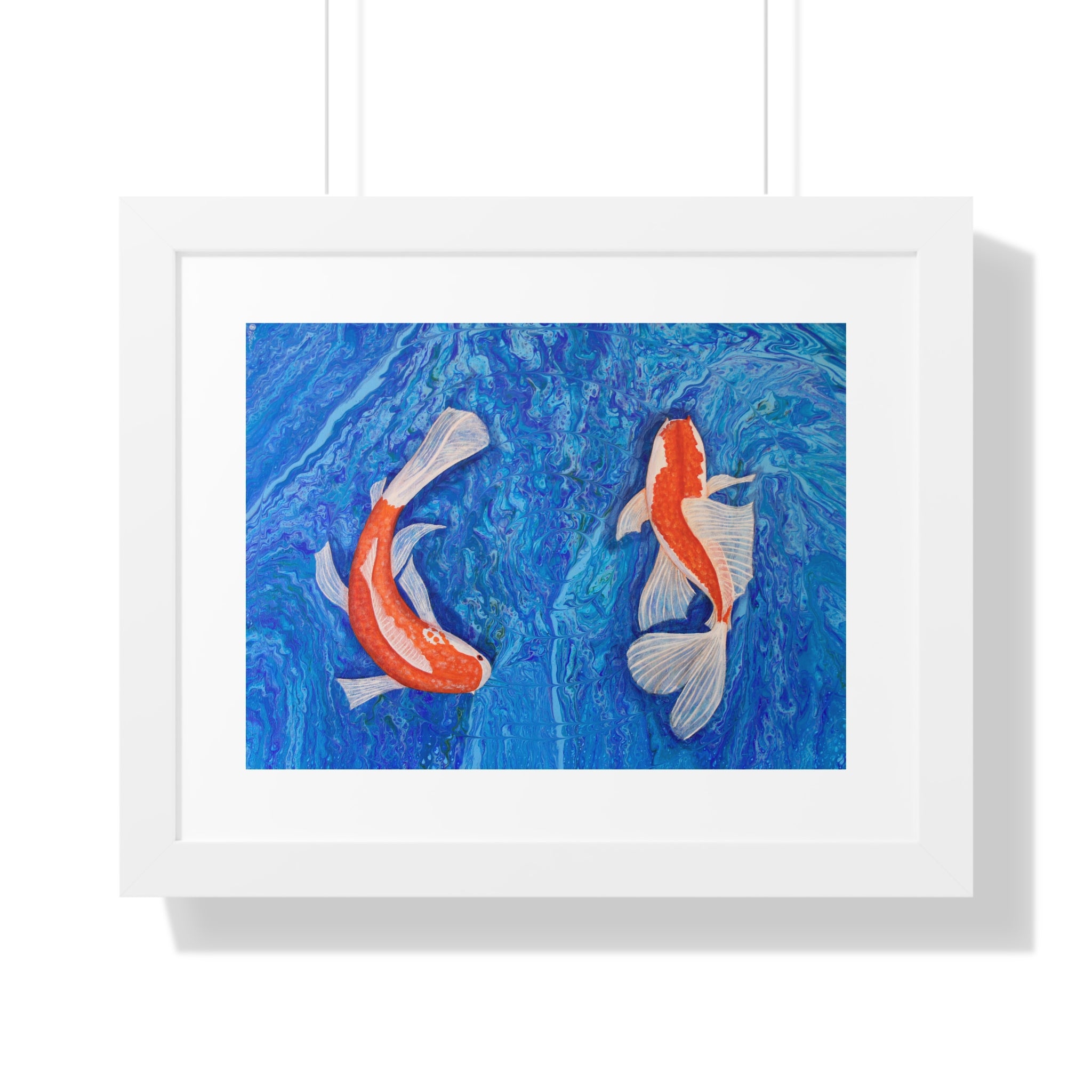 Framed artwork of two koi fish on a blue background
