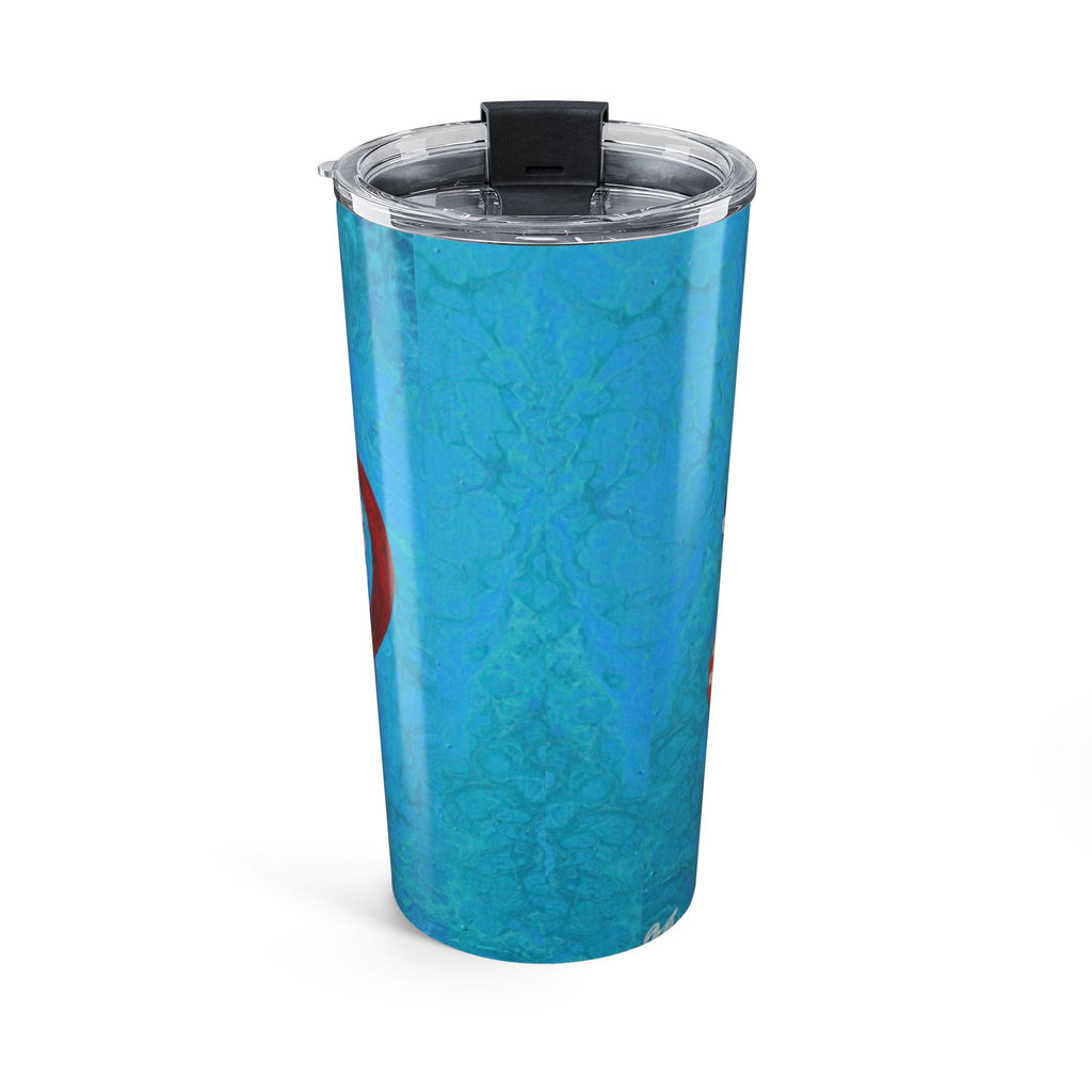 Blue tumbler with a clear lid on a white background