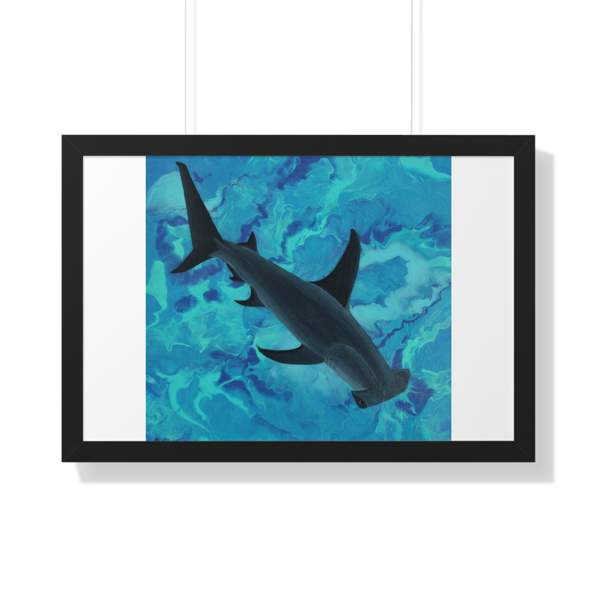 Framed artwork of a shark swimming underwater with a blue and green pattern.