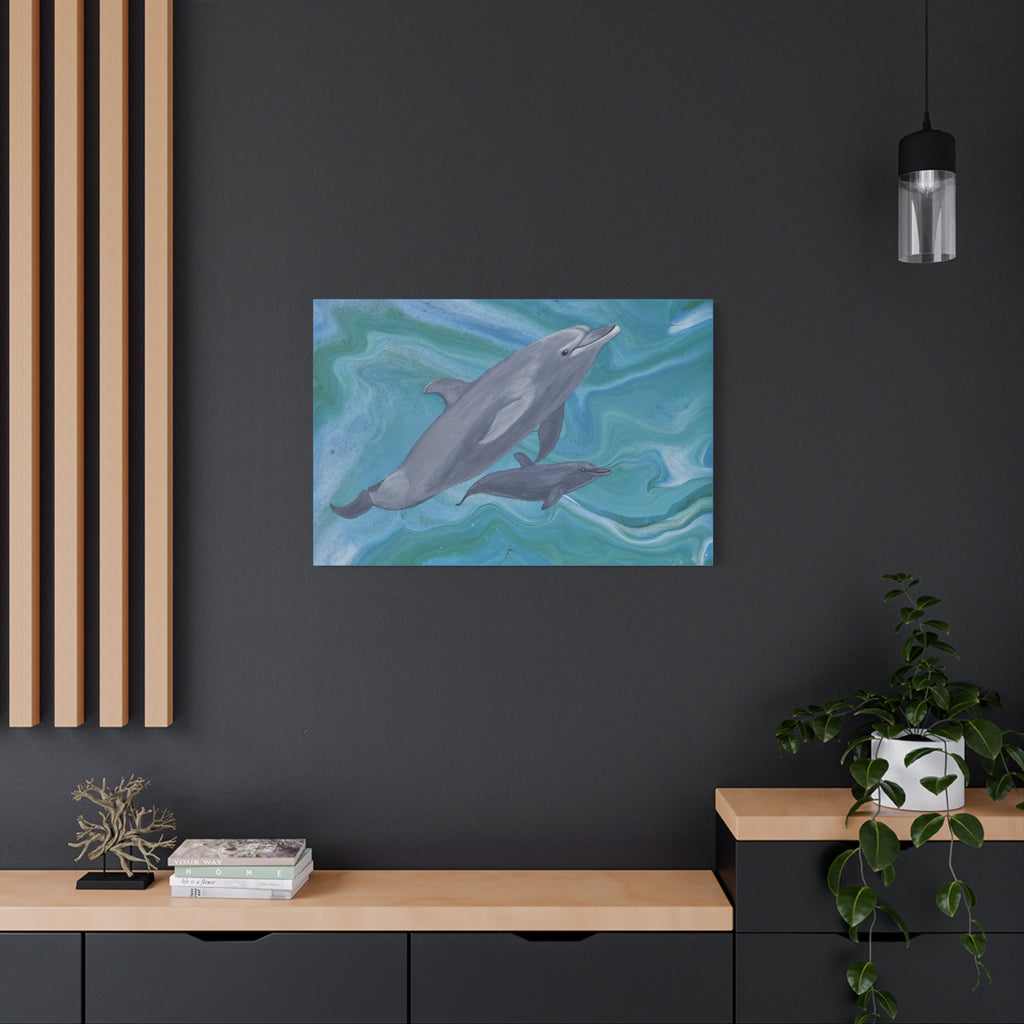 Framed artwork of dolphins on a dark wall above a wooden shelf.