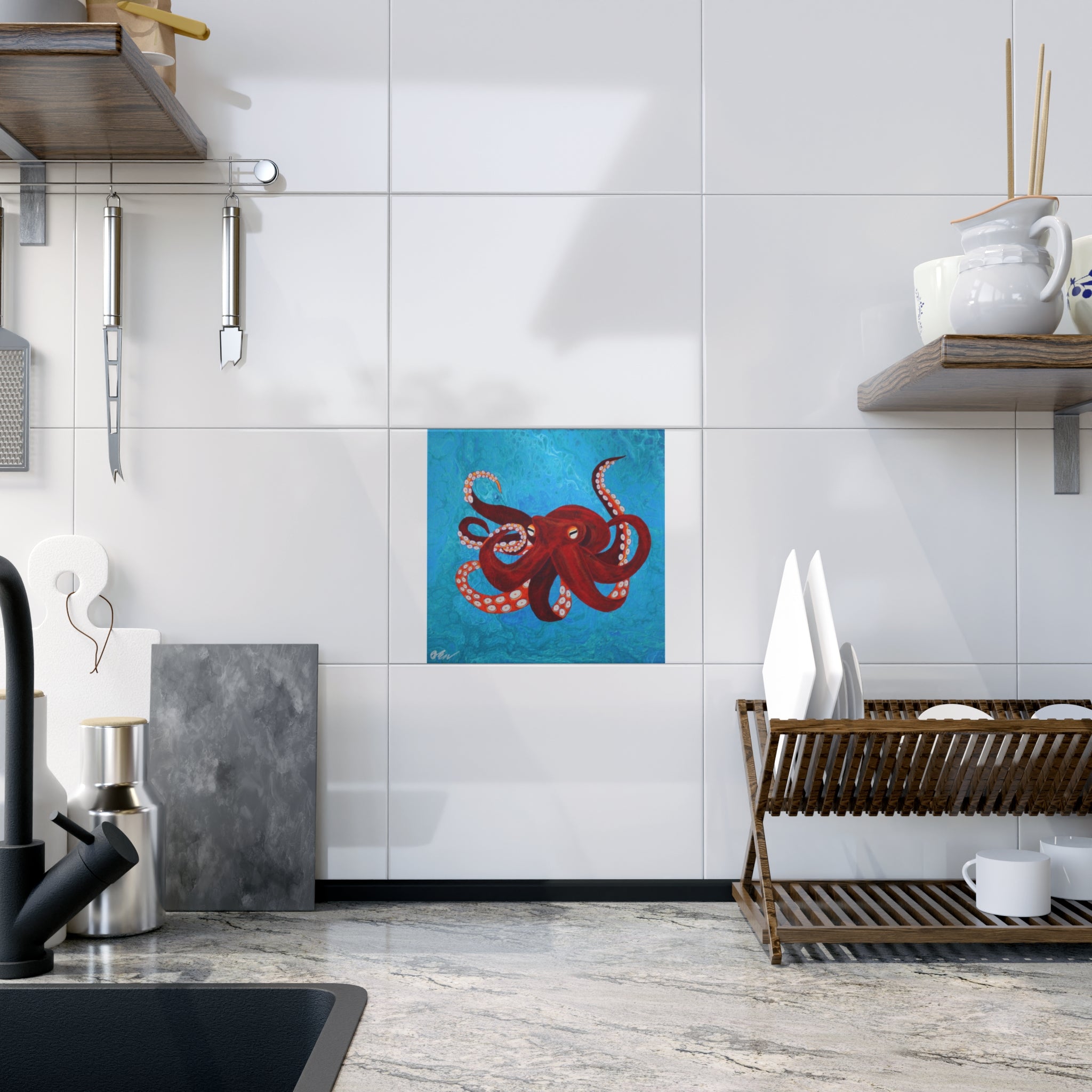 Modern kitchen with a red octopus artwork on the wall