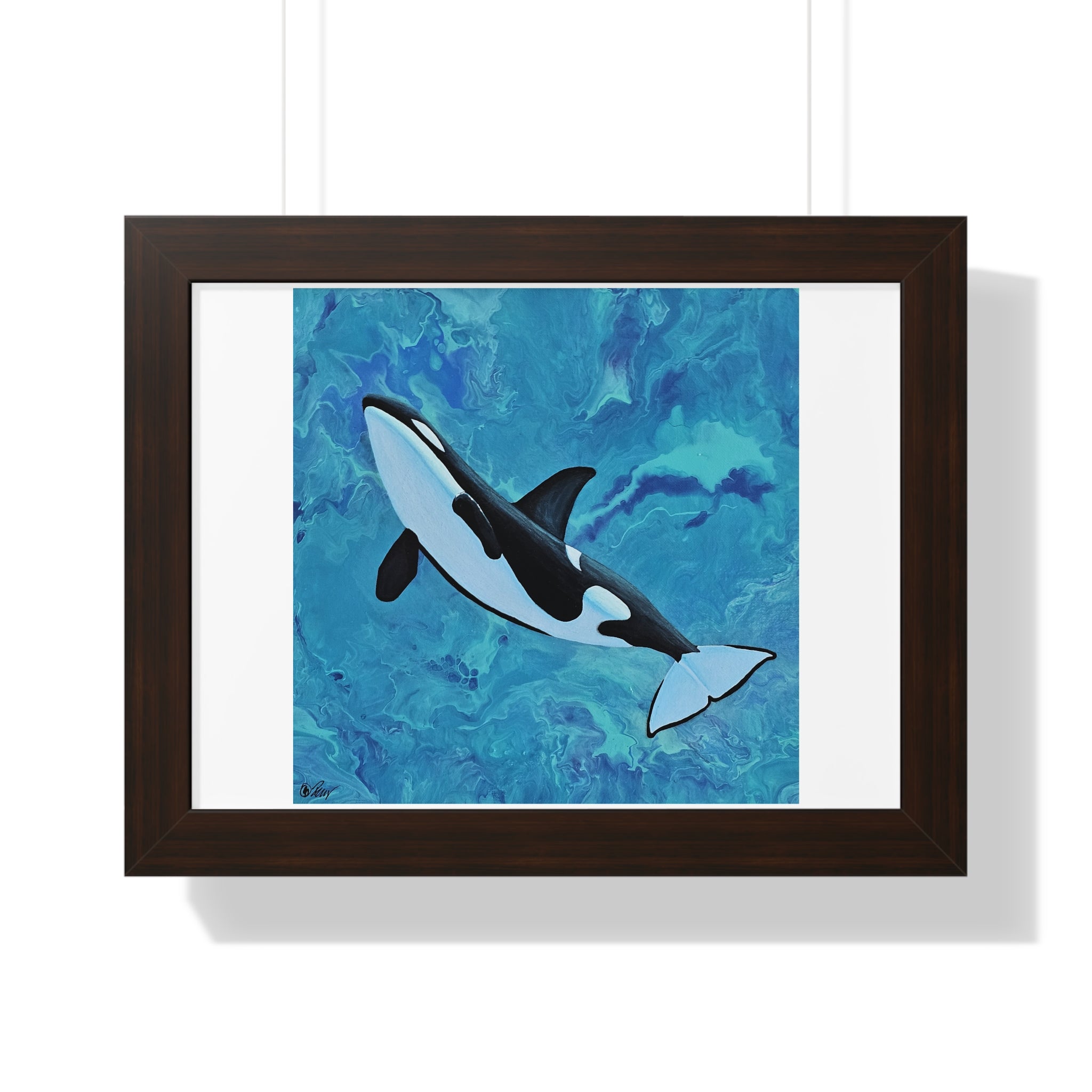 Framed artwork of an orca whale on a blue abstract background