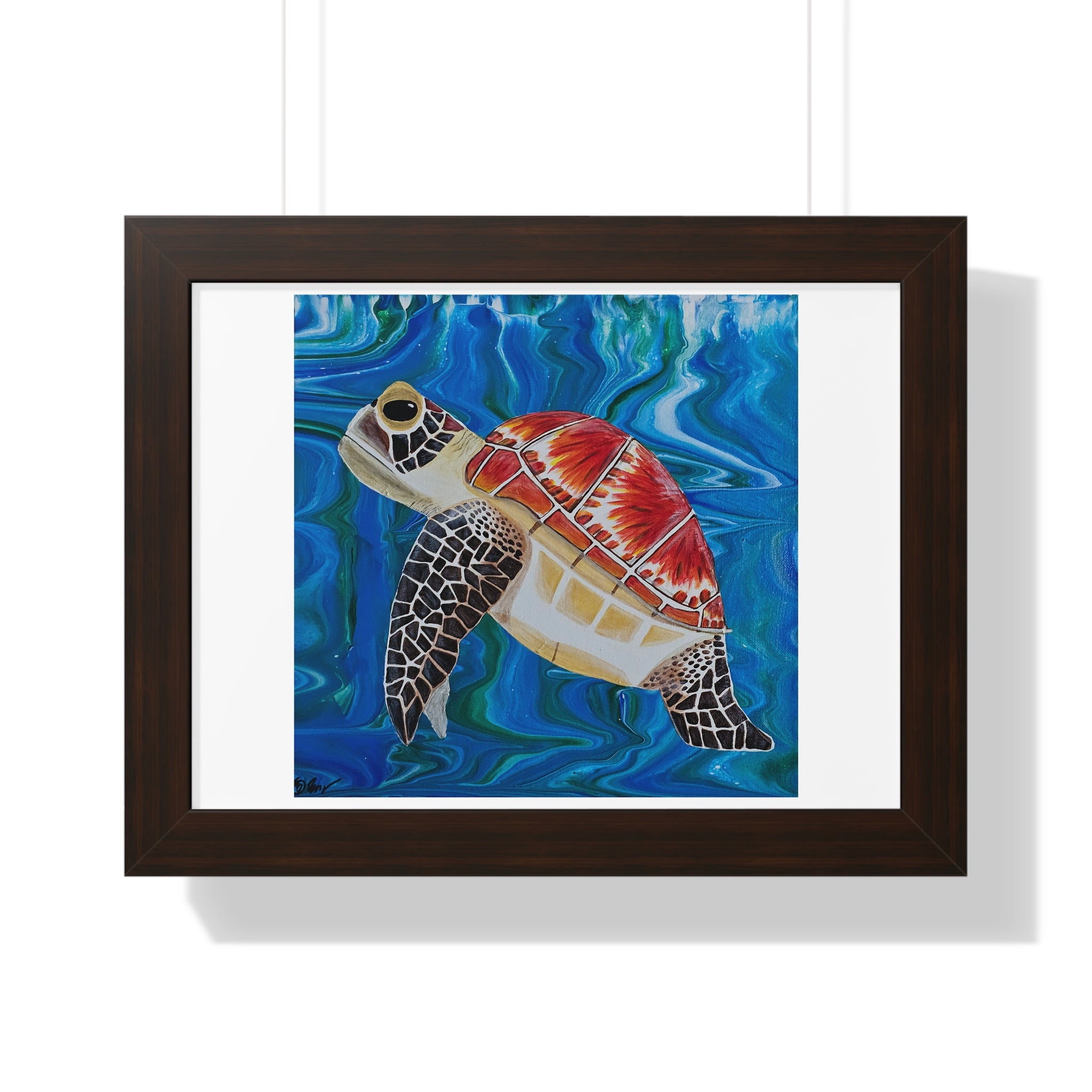 Framed artwork of a turtle with a colorful shell against a blue wave background.