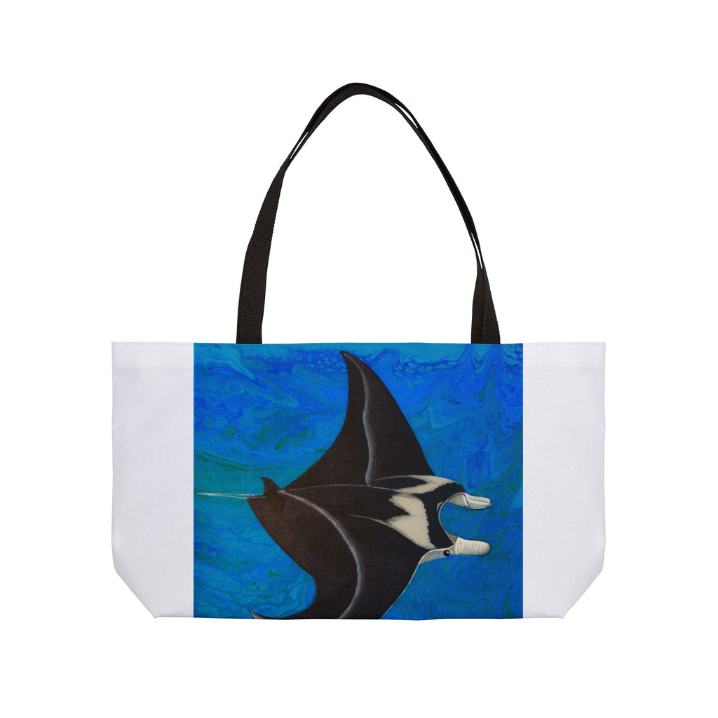 Tote bag with manta ray design on a blue and white background