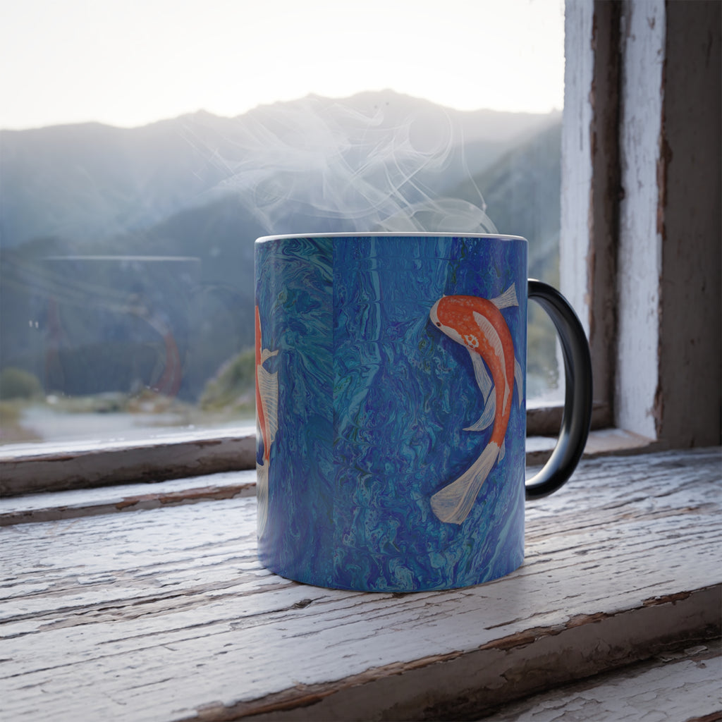 Mug with fish design on a windowsill with a mountain view