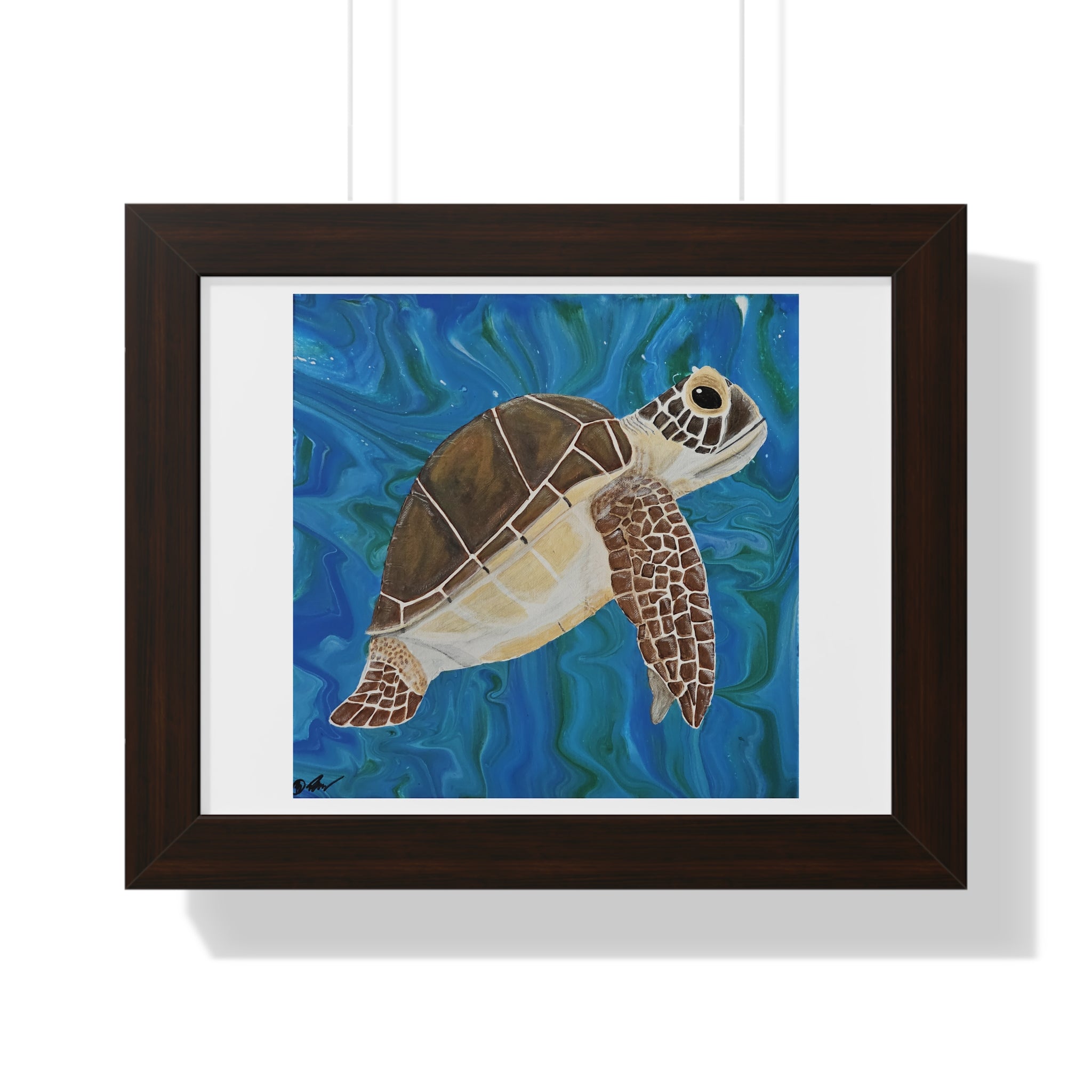 Framed artwork of a turtle swimming underwater with a blue background