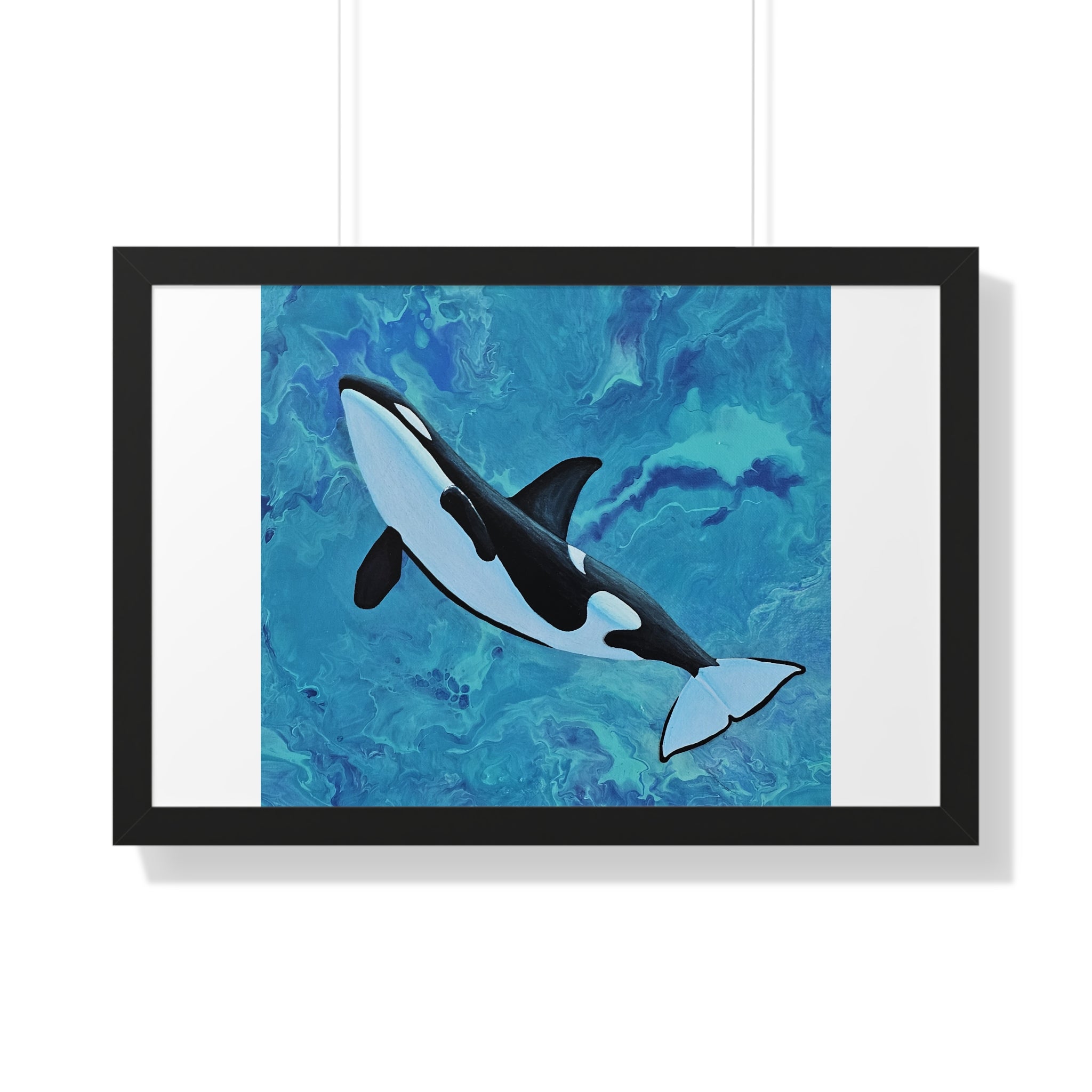 Framed artwork of an orca whale on a blue abstract background