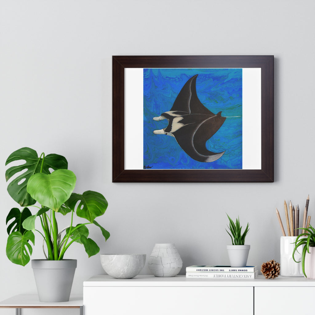 Framed artwork of a manta ray on a wall above a white cabinet with decorative items.