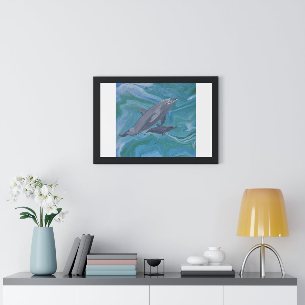 Framed artwork of dolphins on a wall above a shelf with decor items.
