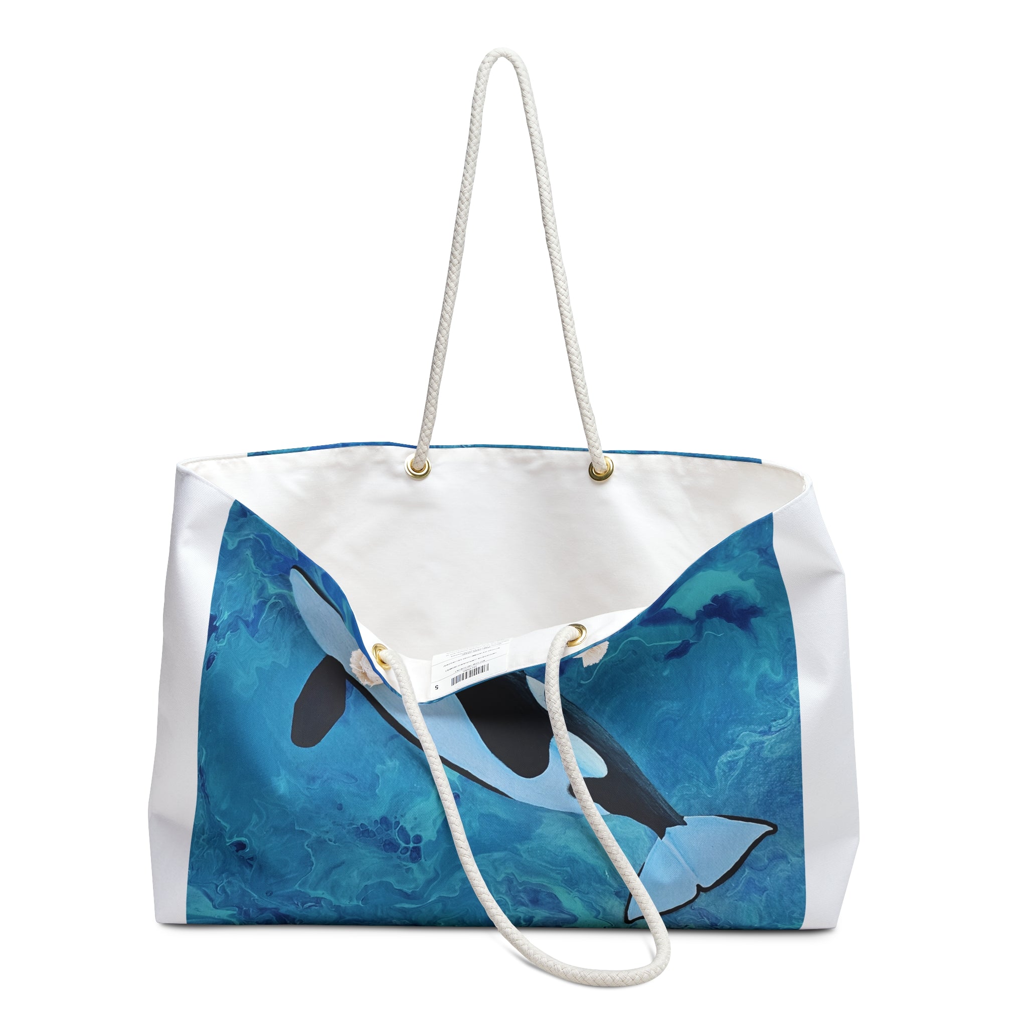 Tote bag with whale design on a white background