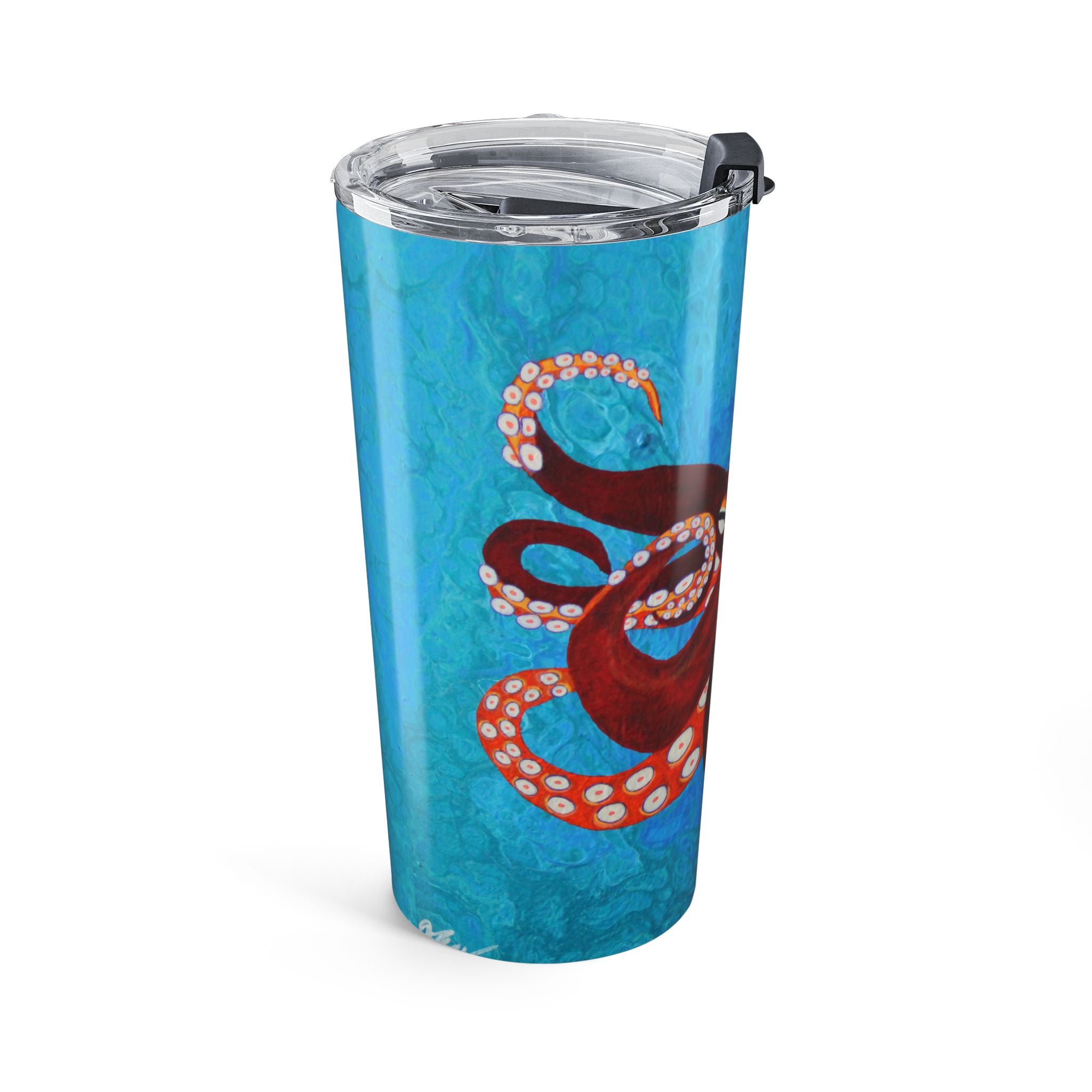 Tumbler with octopus design on a blue background